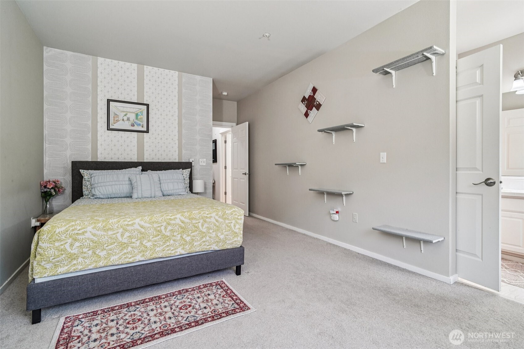 2009 196th Street Southeast, Unit C103 Bothell, WA 98012 - Photo 13 of 30 a bedroom with a bed and a shower