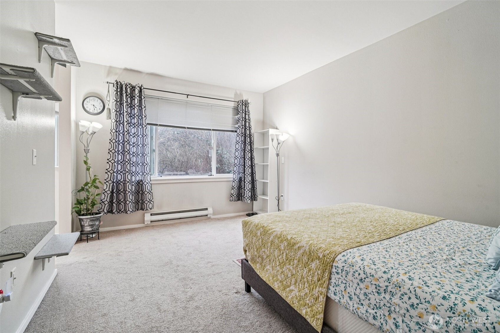 2009 196th Street Southeast, Unit C103 Bothell, WA 98012 - Photo 14 of 30 a bedroom with a bed and a window