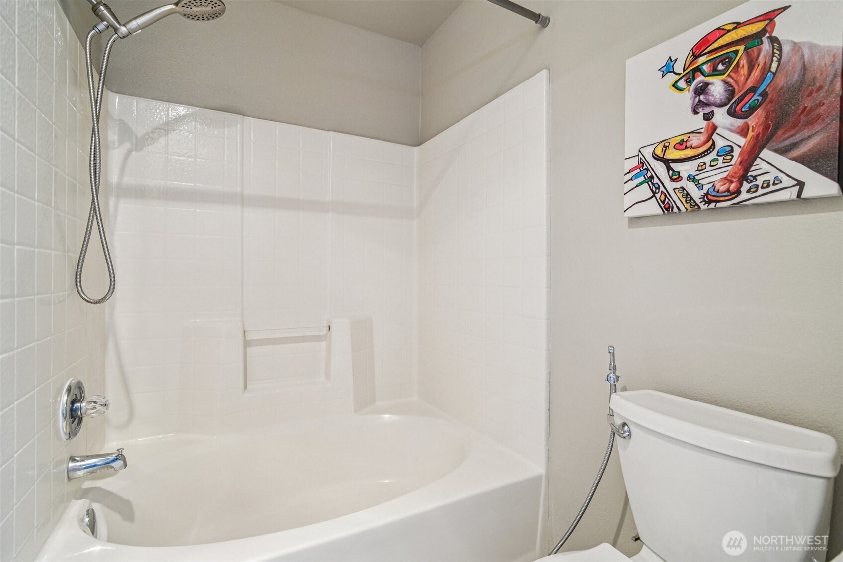 2009 196th Street Southeast, Unit C103 Bothell, WA 98012 - Photo 16 of 30 a white bath tub sitting next to a white toilet and vanity