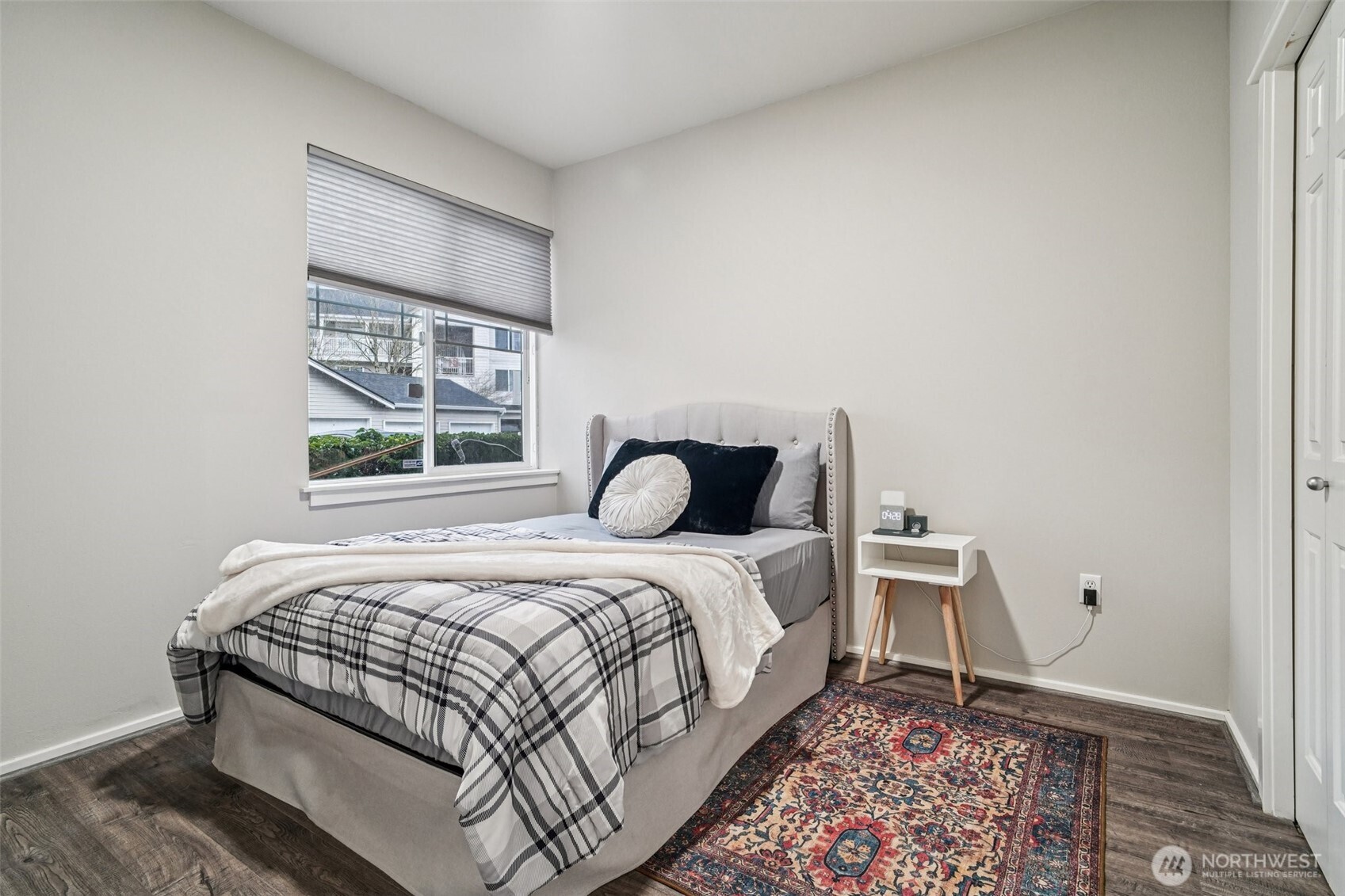2009 196th Street Southeast, Unit C103 Bothell, WA 98012 - Photo 18 of 30 a bedroom with a bed and a window