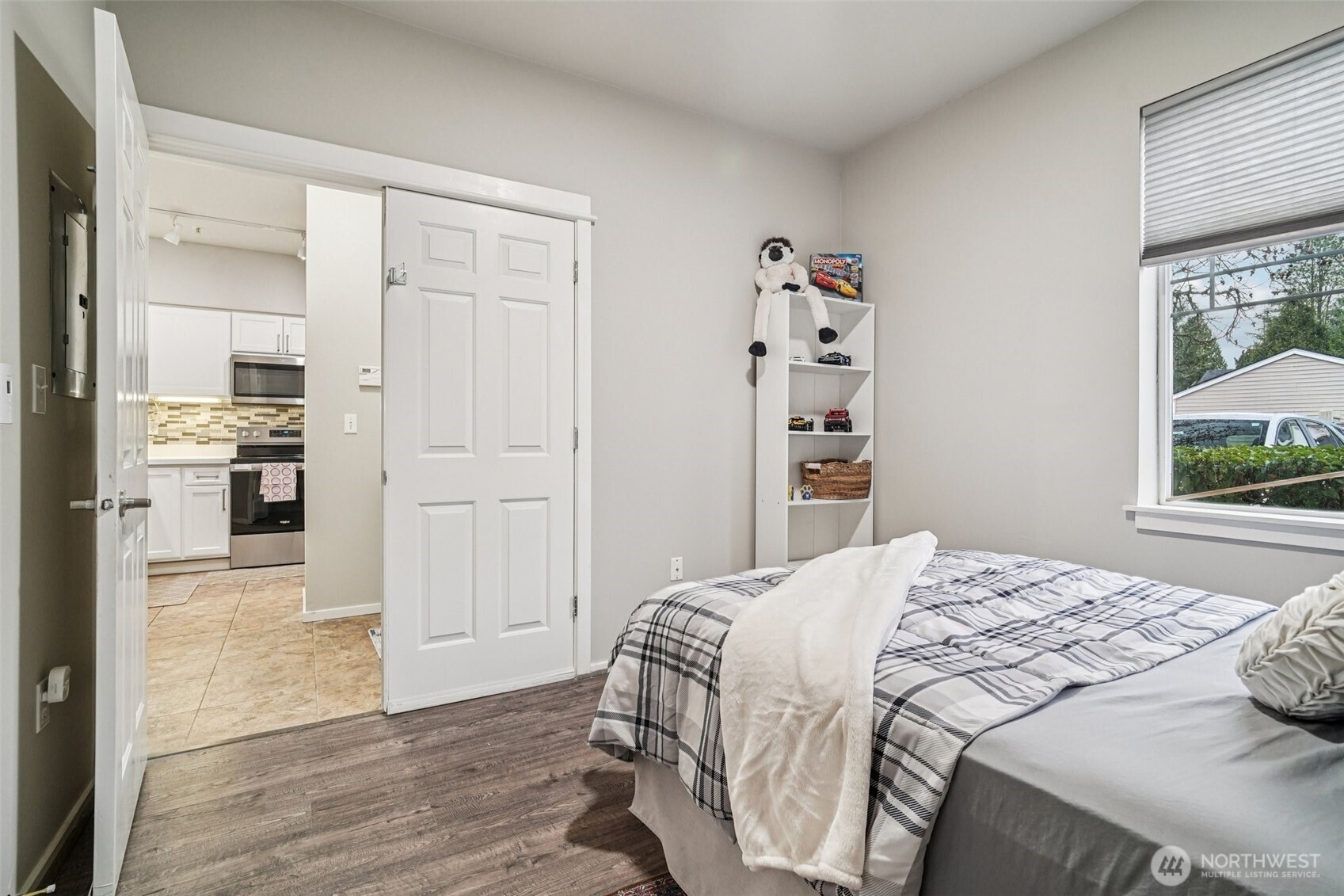 2009 196th Street Southeast, Unit C103 Bothell, WA 98012 - Photo 19 of 30 a bedroom with a bed and a window