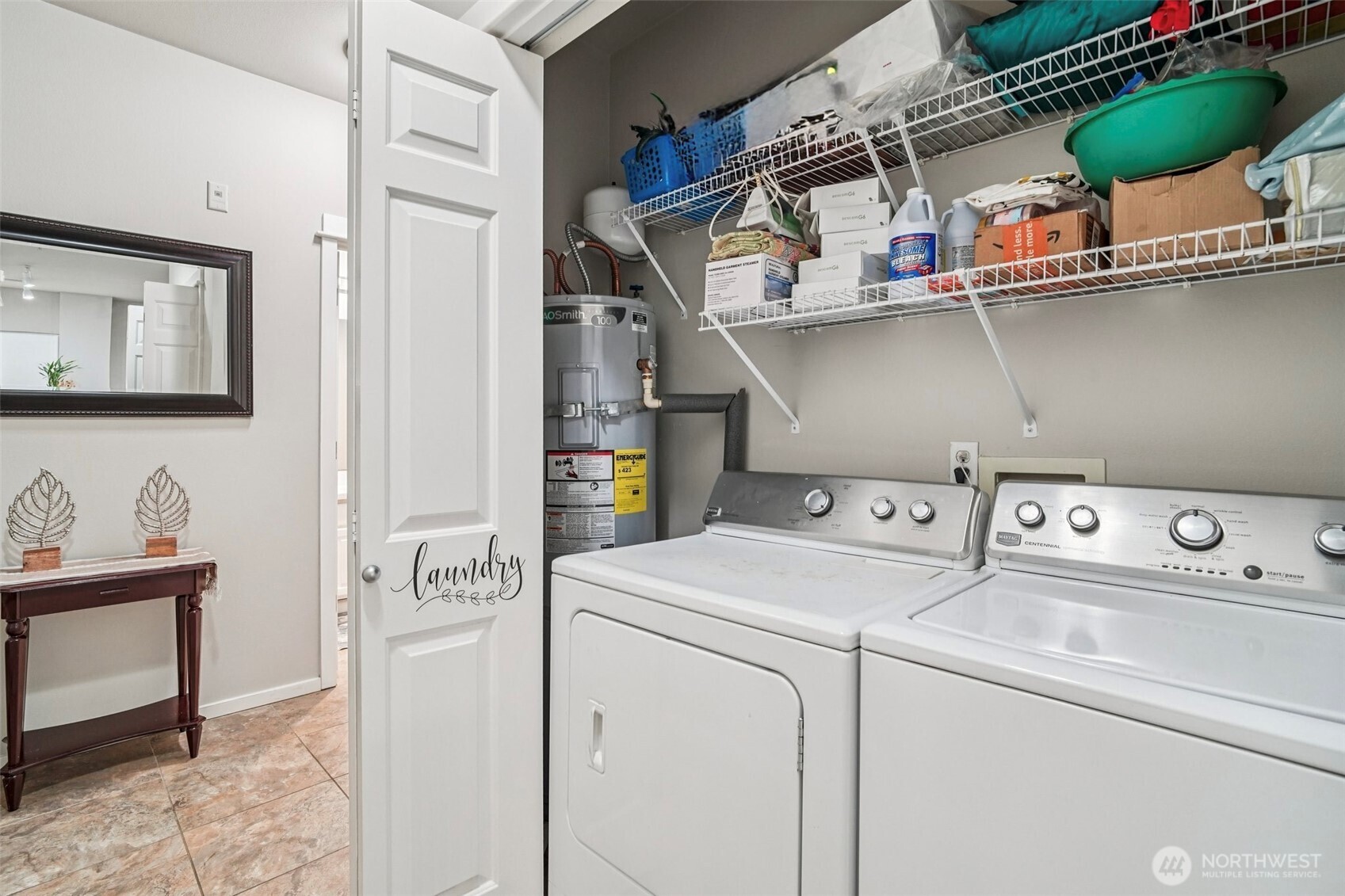 2009 196th Street Southeast, Unit C103 Bothell, WA 98012 - Photo 23 of 30 a utility room with dryer and washer