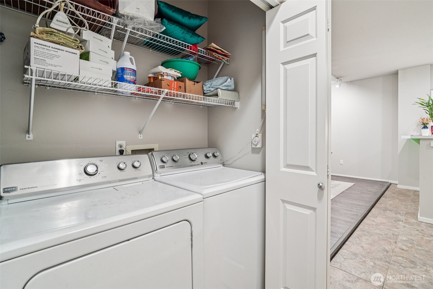 2009 196th Street Southeast, Unit C103 Bothell, WA 98012 - Photo 24 of 30 a utility room with dryer and washer