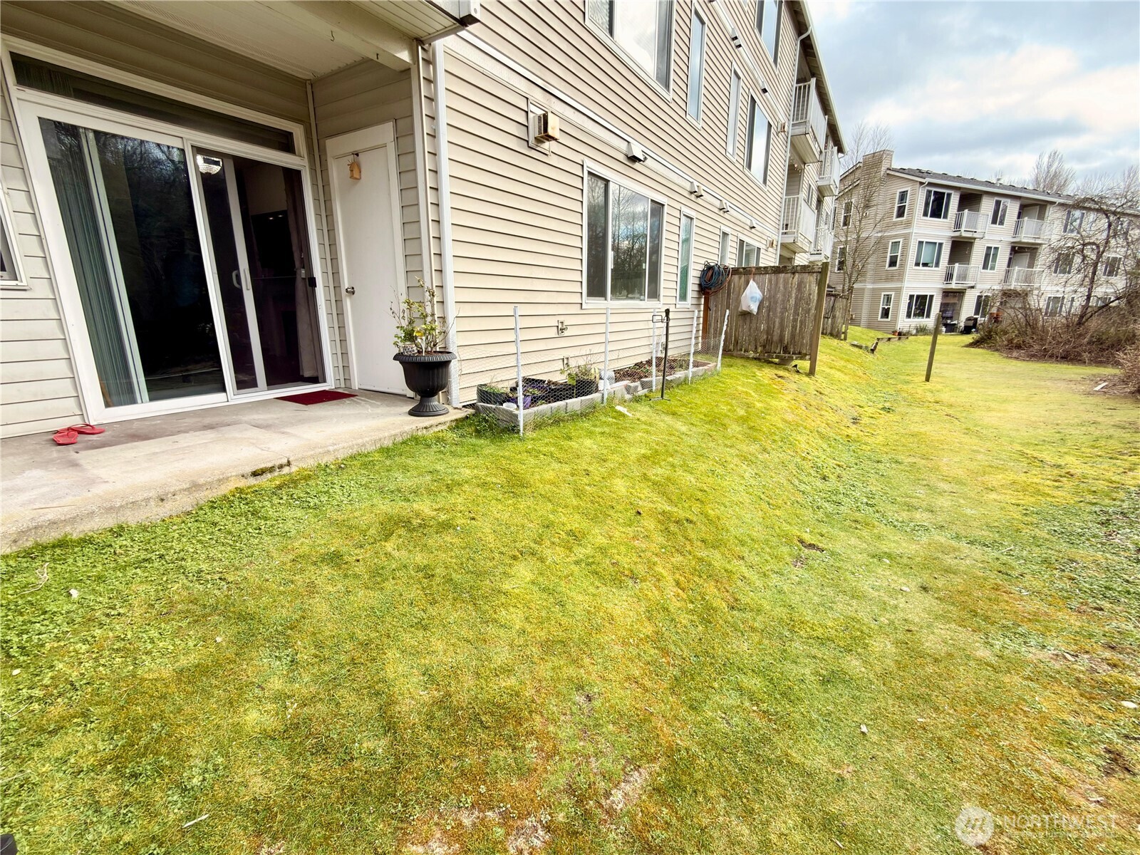 2009 196th Street Southeast, Unit C103 Bothell, WA 98012 - Photo 28 of 30 a view of house with yard