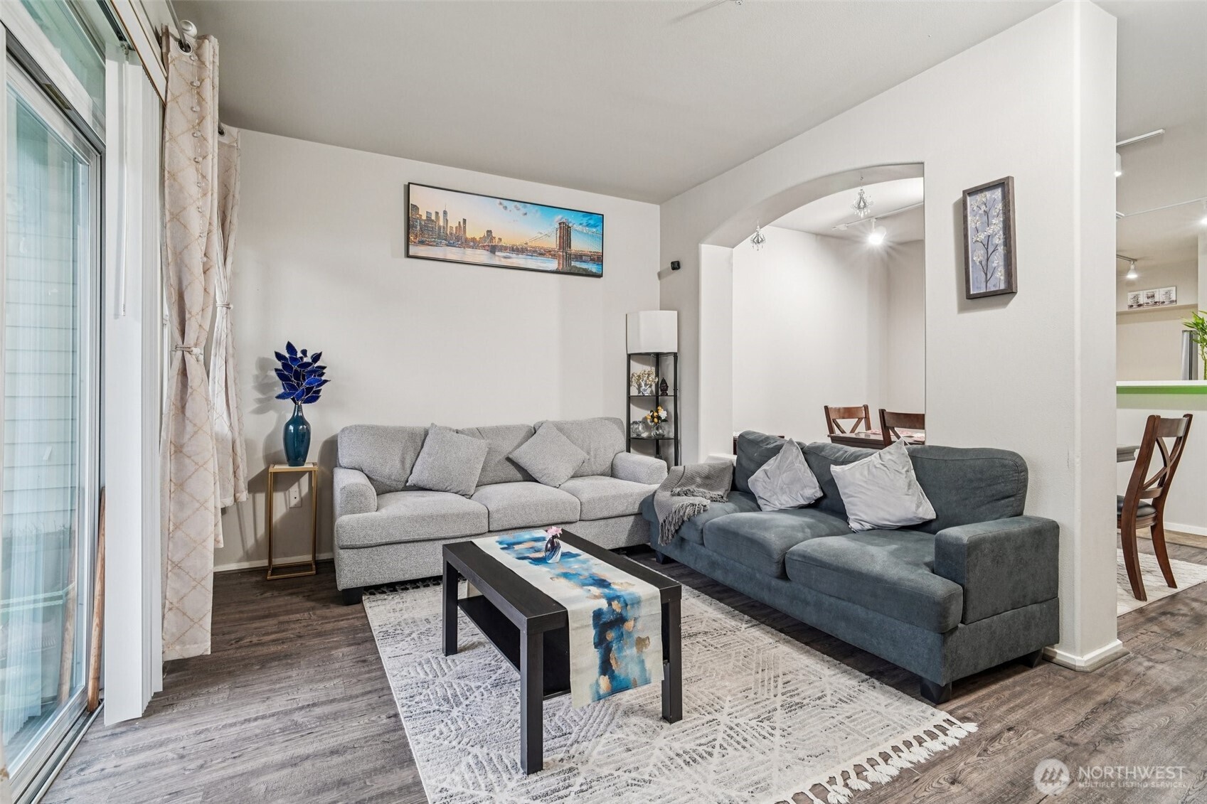 2009 196th Street Southeast, Unit C103 Bothell, WA 98012 - Photo 3 of 30 a living room with furniture and wooden floor