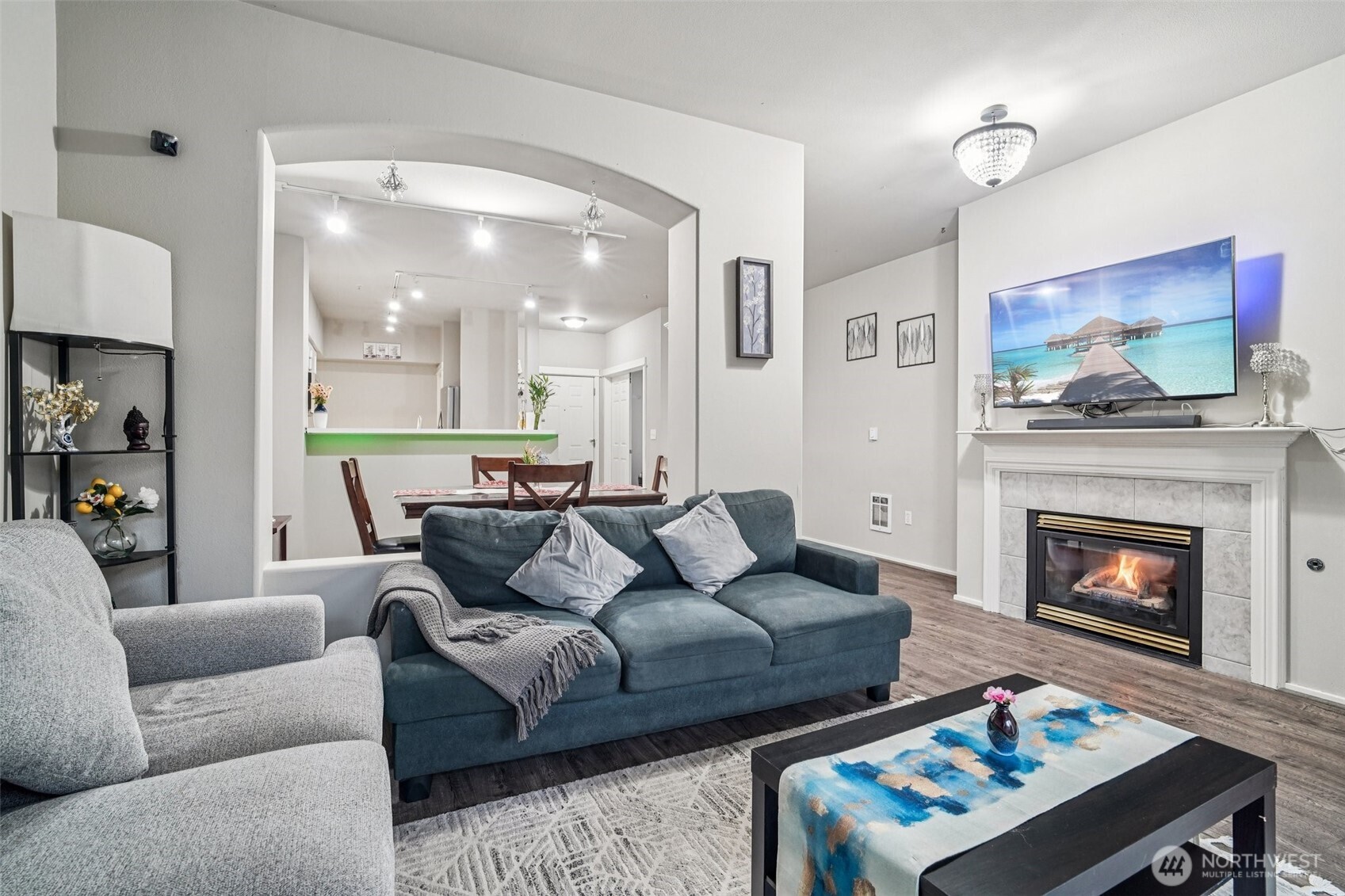 2009 196th Street Southeast, Unit C103 Bothell, WA 98012 - Photo 4 of 30 a living room with furniture and a fireplace