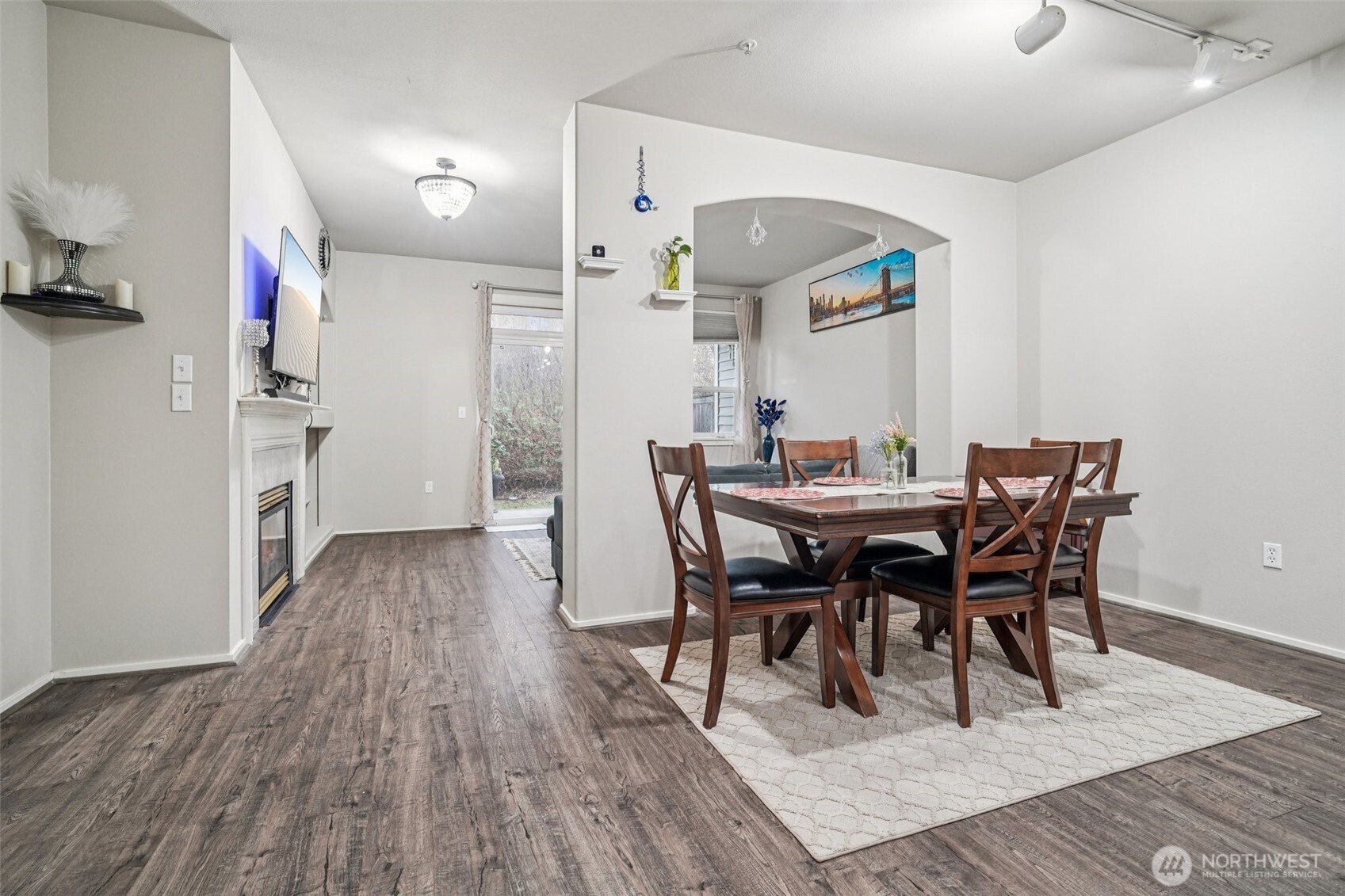 2009 196th Street Southeast, Unit C103 Bothell, WA 98012 - Photo 5 of 30 a view of a dining room with furniture and wooden floor