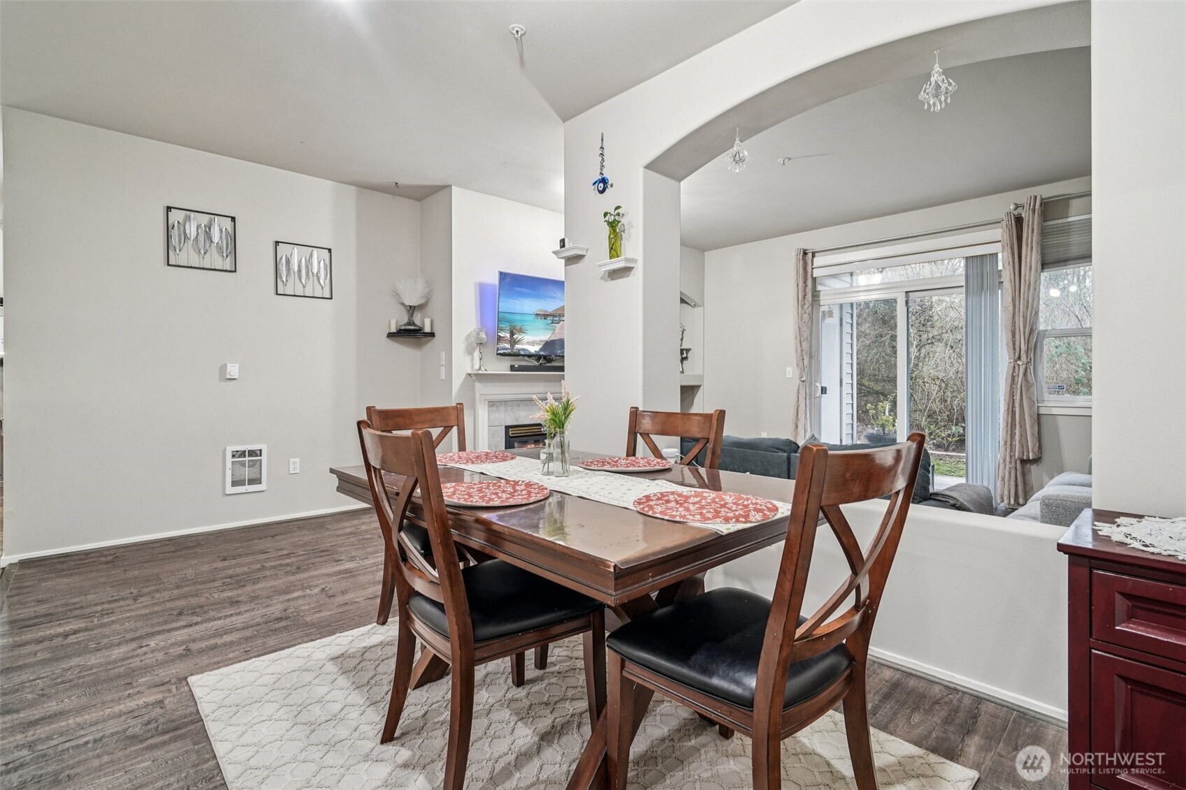 2009 196th Street Southeast, Unit C103 Bothell, WA 98012 - Photo 7 of 30 a view of a dining room with furniture and wooden floor