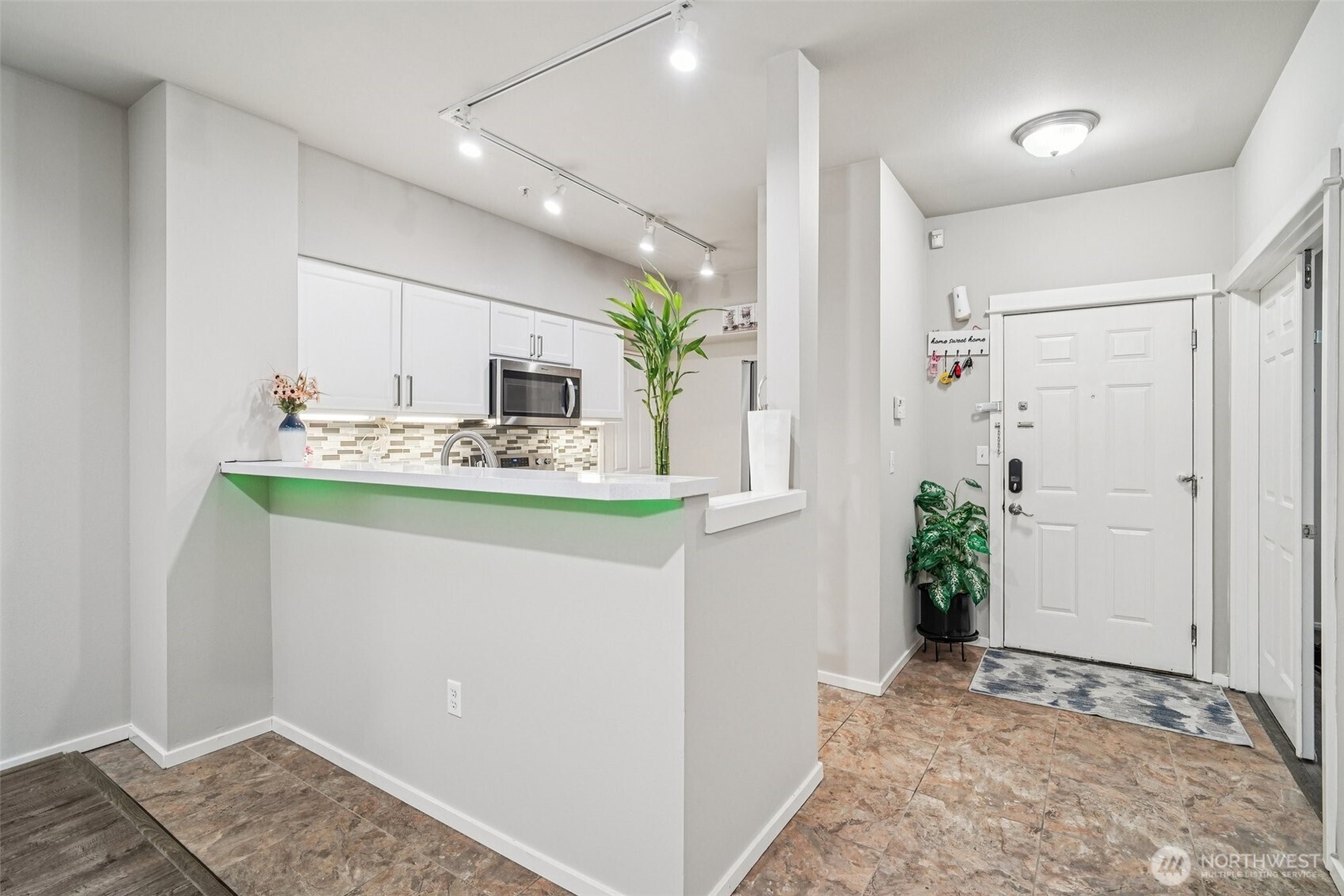 2009 196th Street Southeast, Unit C103 Bothell, WA 98012 - Photo 8 of 30 a bathroom with sink and mirror