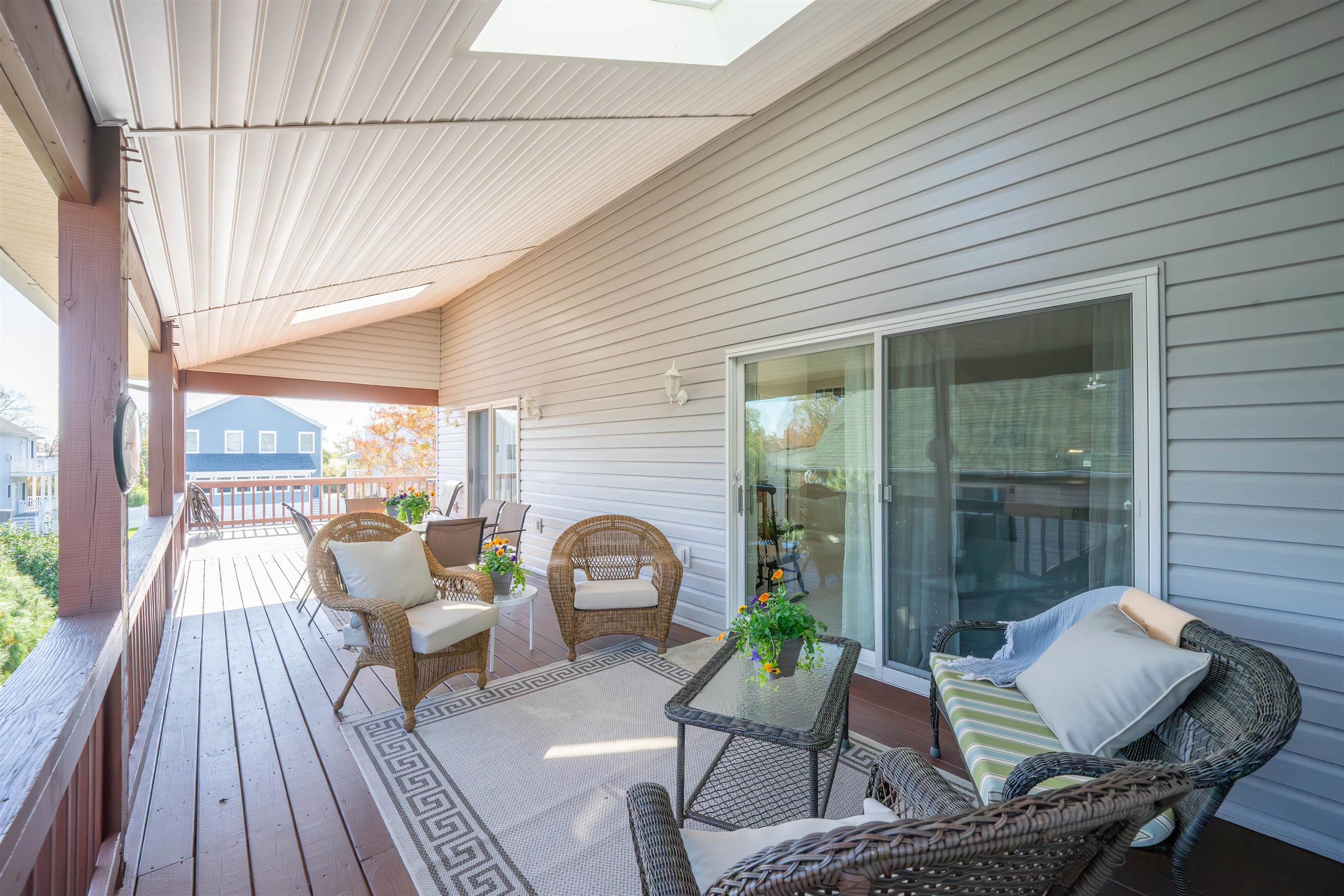 210 3rd West Cape Cape May, NJ 08204 - Photo 13 of 31 a house view with a seating space and garden view