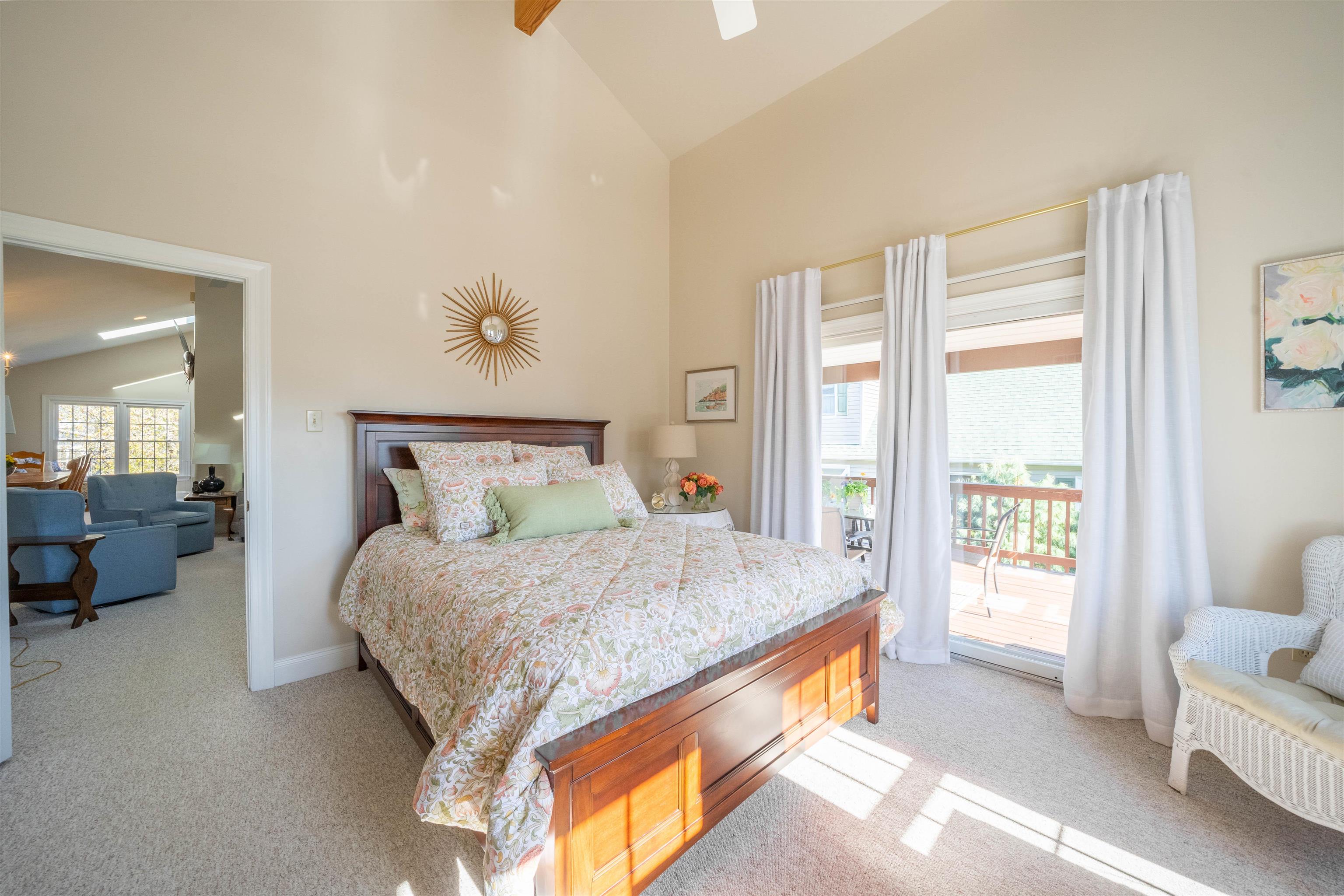 210 3rd West Cape Cape May, NJ 08204 - Photo 15 of 31 a bed sitting in a bedroom next to a window