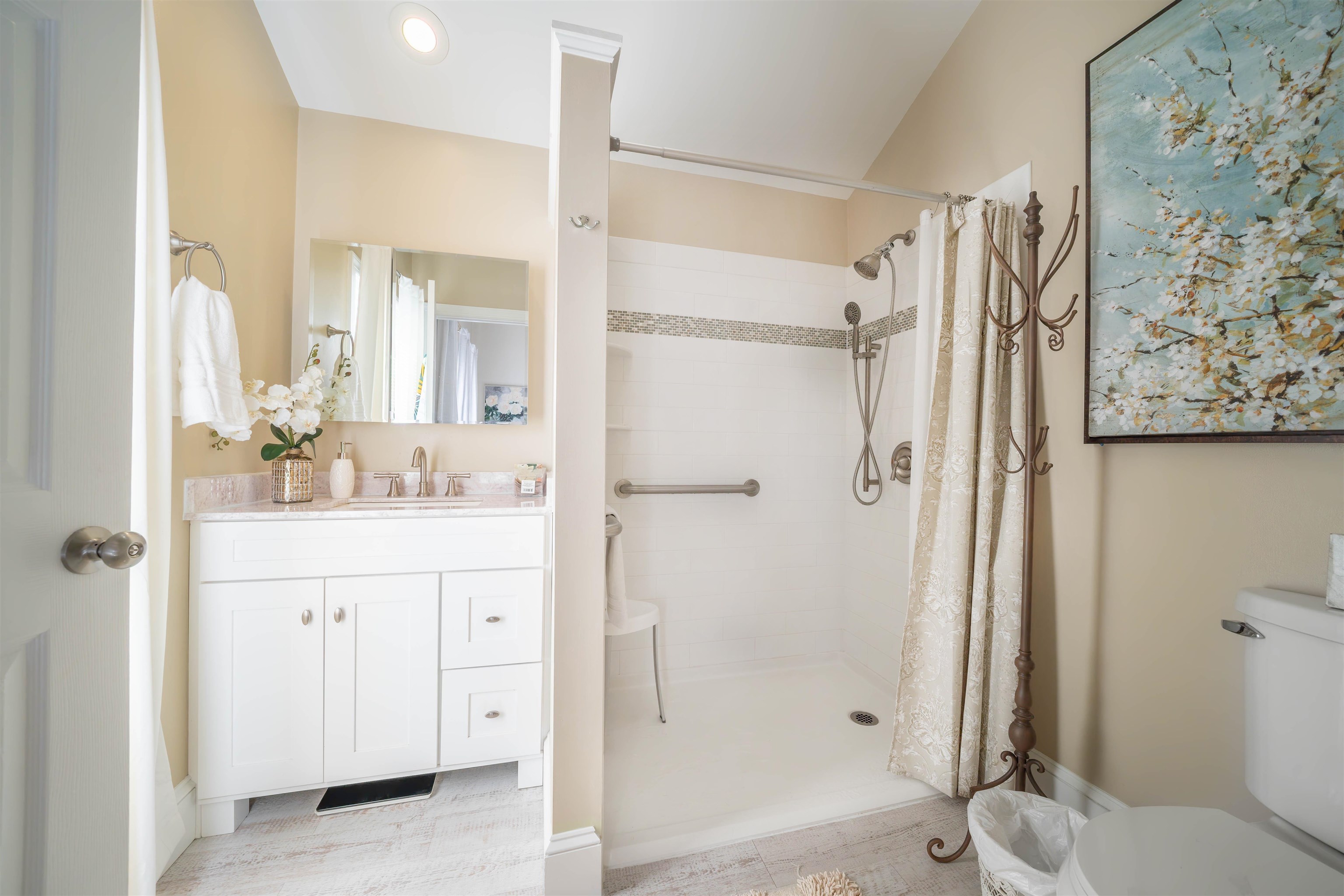 210 3rd West Cape Cape May, NJ 08204 - Photo 17 of 31 a bathroom with a shower sink and mirror