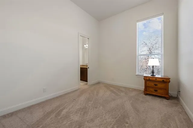 a view of a workspace with furniture