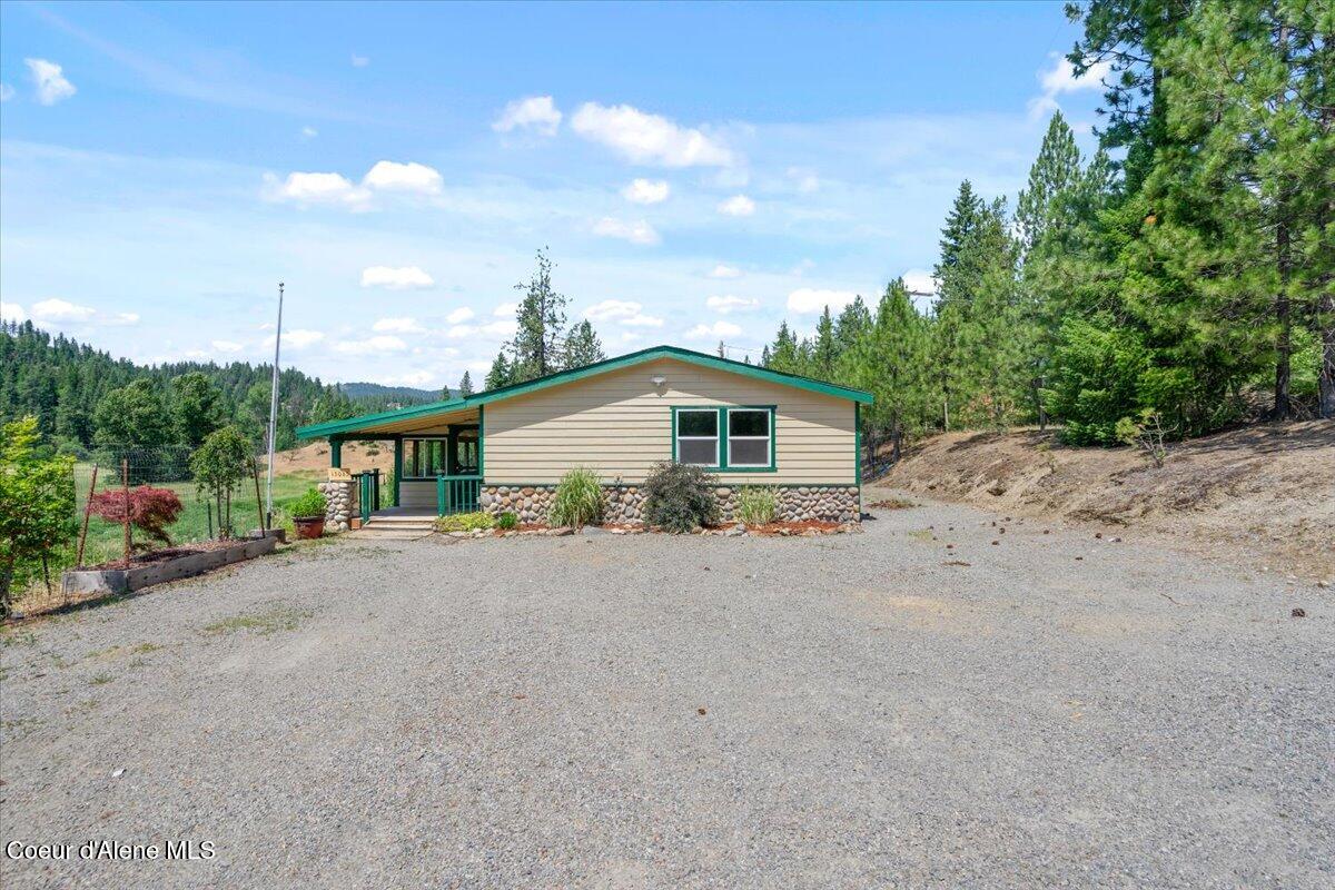 13085 North Ragged Ridge Road Post Falls, ID 83854 - Photo 7 of 45 07-Front of home