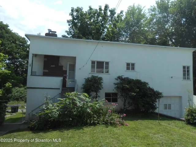 front view of house with a yard