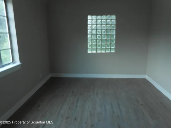 a view of a window in an empty room