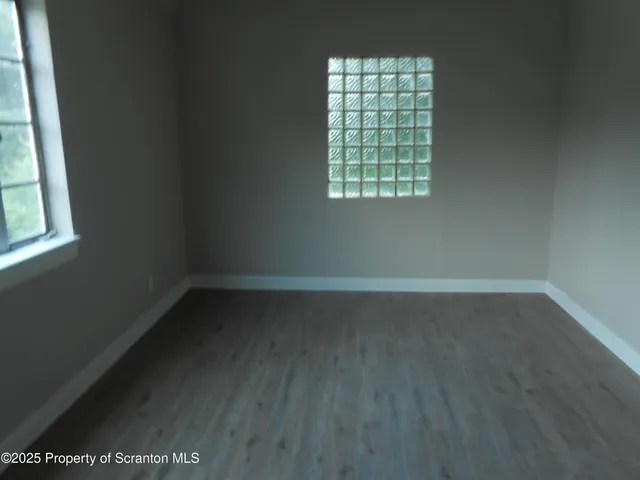 a view of a window in an empty room