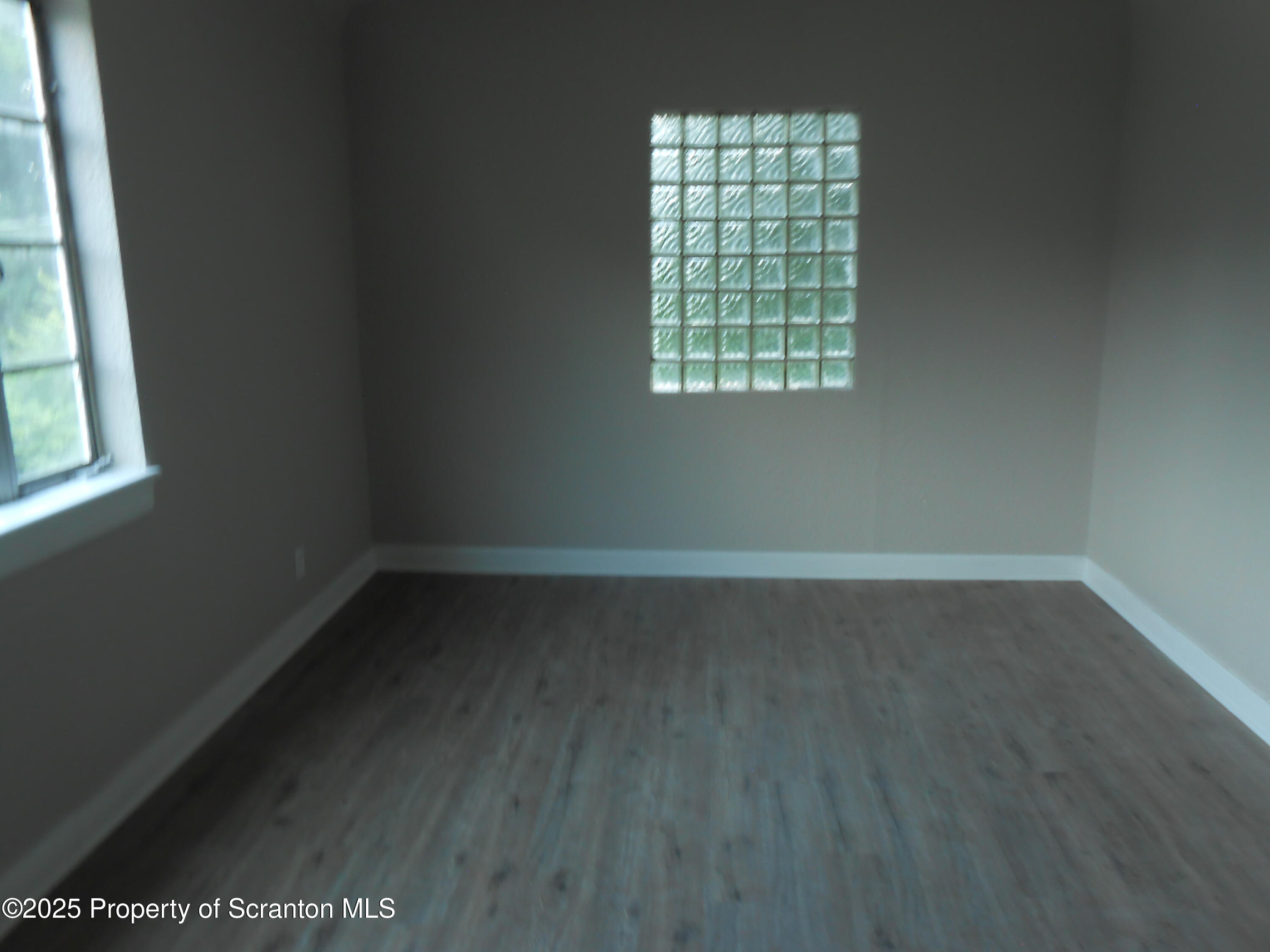 622 North Main Avenue, Unit 7 Scranton, PA 18504 - Photo 12 of 14 an empty room with a window