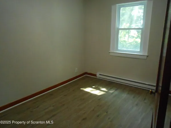 a view of empty room with window