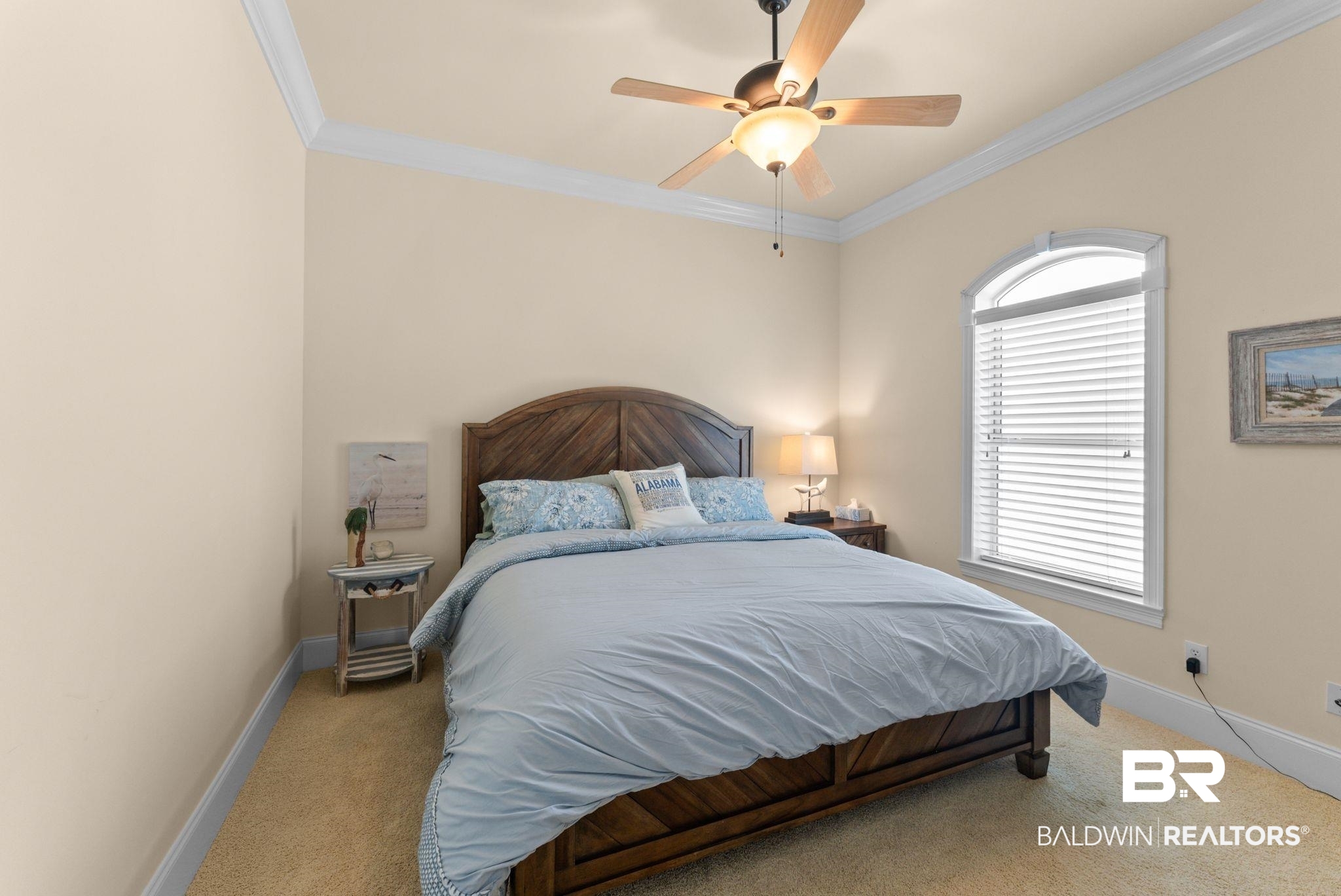 30818 River Road Orange Beach, AL 36561 - Photo 48 of 81 Bedroom with crown molding, carpet, and a ceiling fan