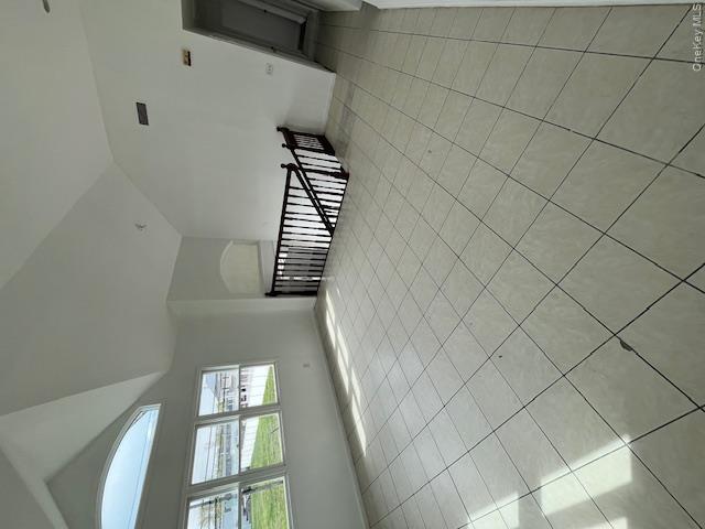 94 Roger Avenue Inwood, NY 11096 - Photo 11 of 28 a view of an empty room and window