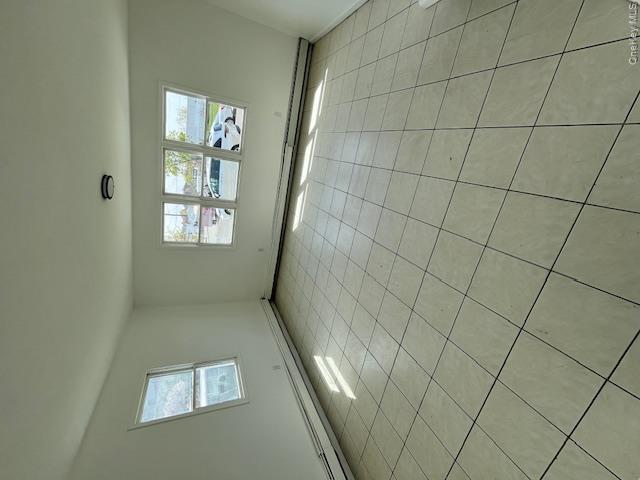 94 Roger Avenue Inwood, NY 11096 - Photo 26 of 28 a view of an empty room and window