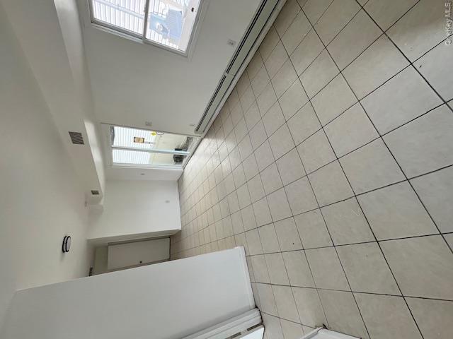 94 Roger Avenue Inwood, NY 11096 - Photo 27 of 28 a view of an empty room and window