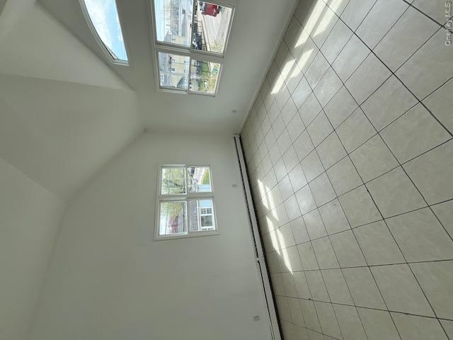 94 Roger Avenue Inwood, NY 11096 - Photo 8 of 28 an empty room with windows