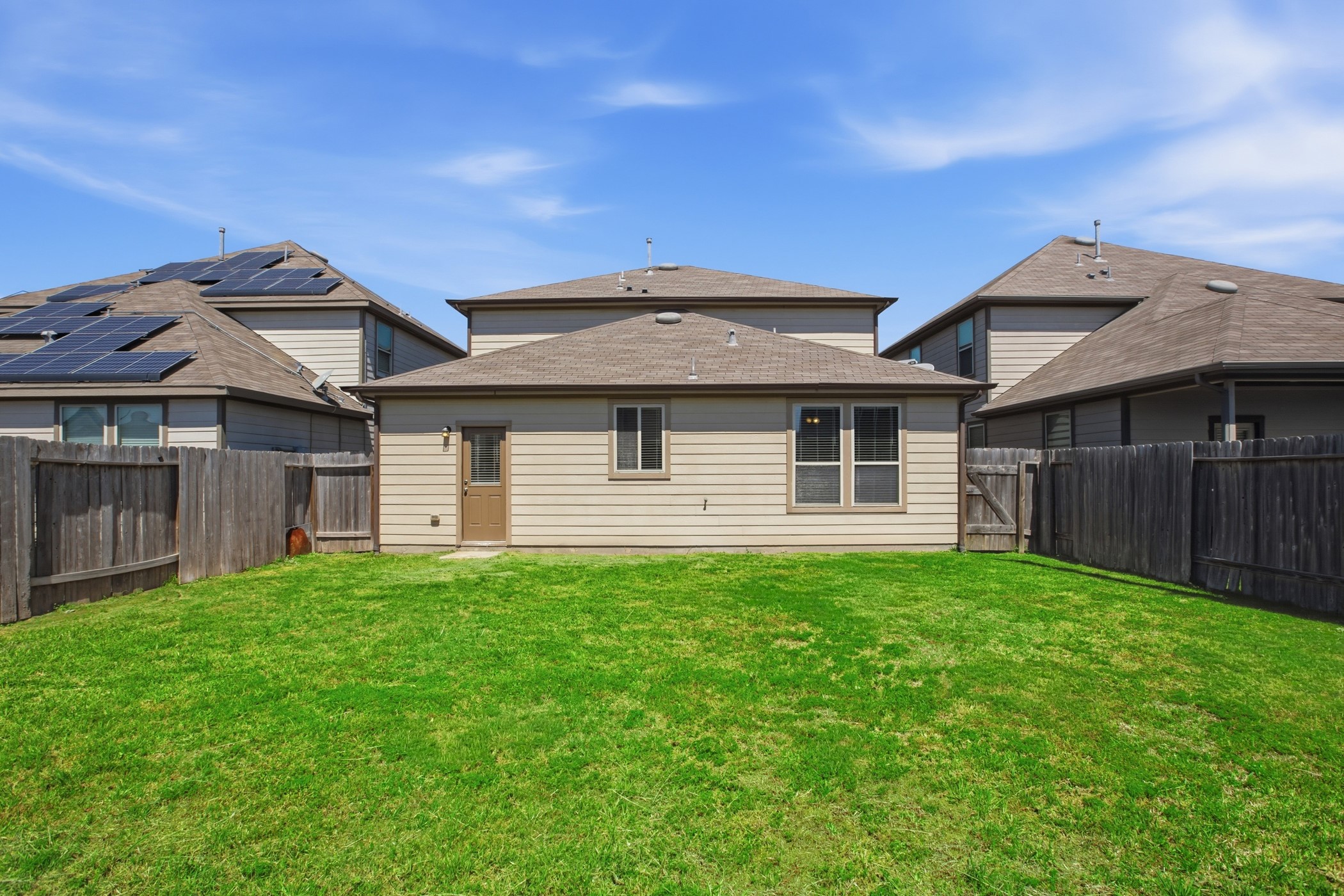 4611 Windmill Run Drive Houston, TX 77069 - Photo 33 of 35 a front view of a house with garden
