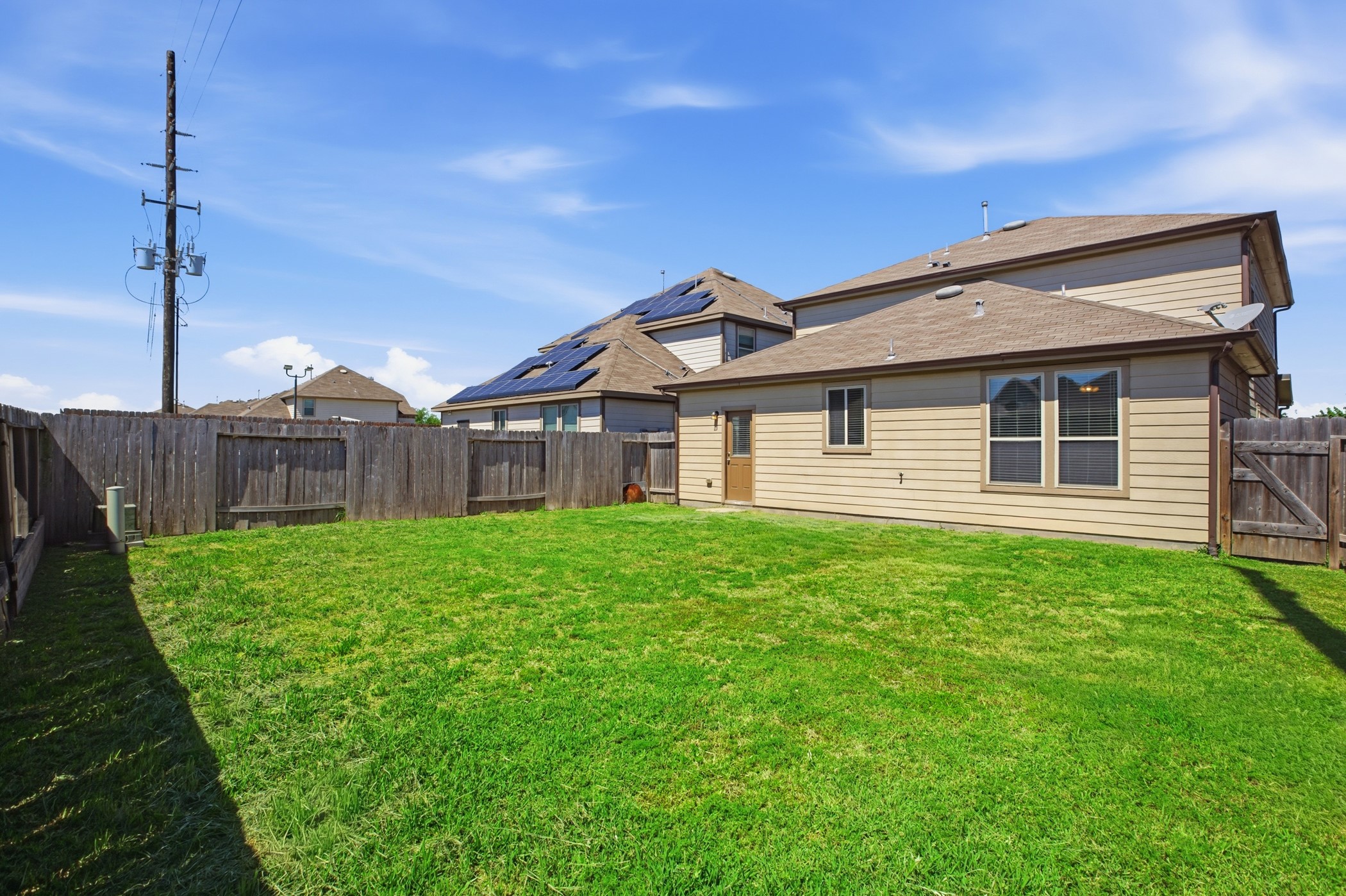 4611 Windmill Run Drive Houston, TX 77069 - Photo 35 of 35 a view of a house with backyard and garden