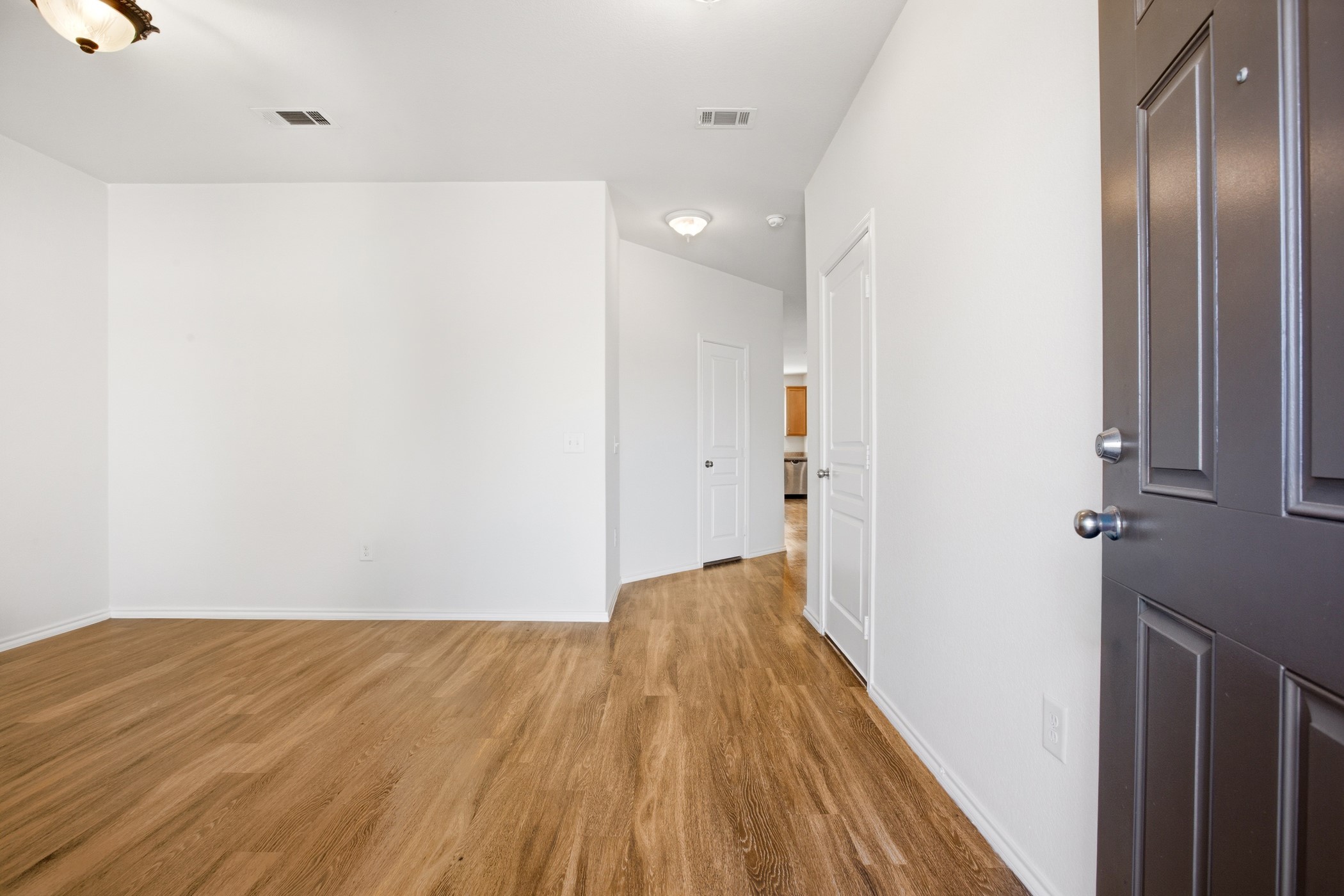 4611 Windmill Run Drive Houston, TX 77069 - Photo 6 of 35 a view of a room with wooden floor