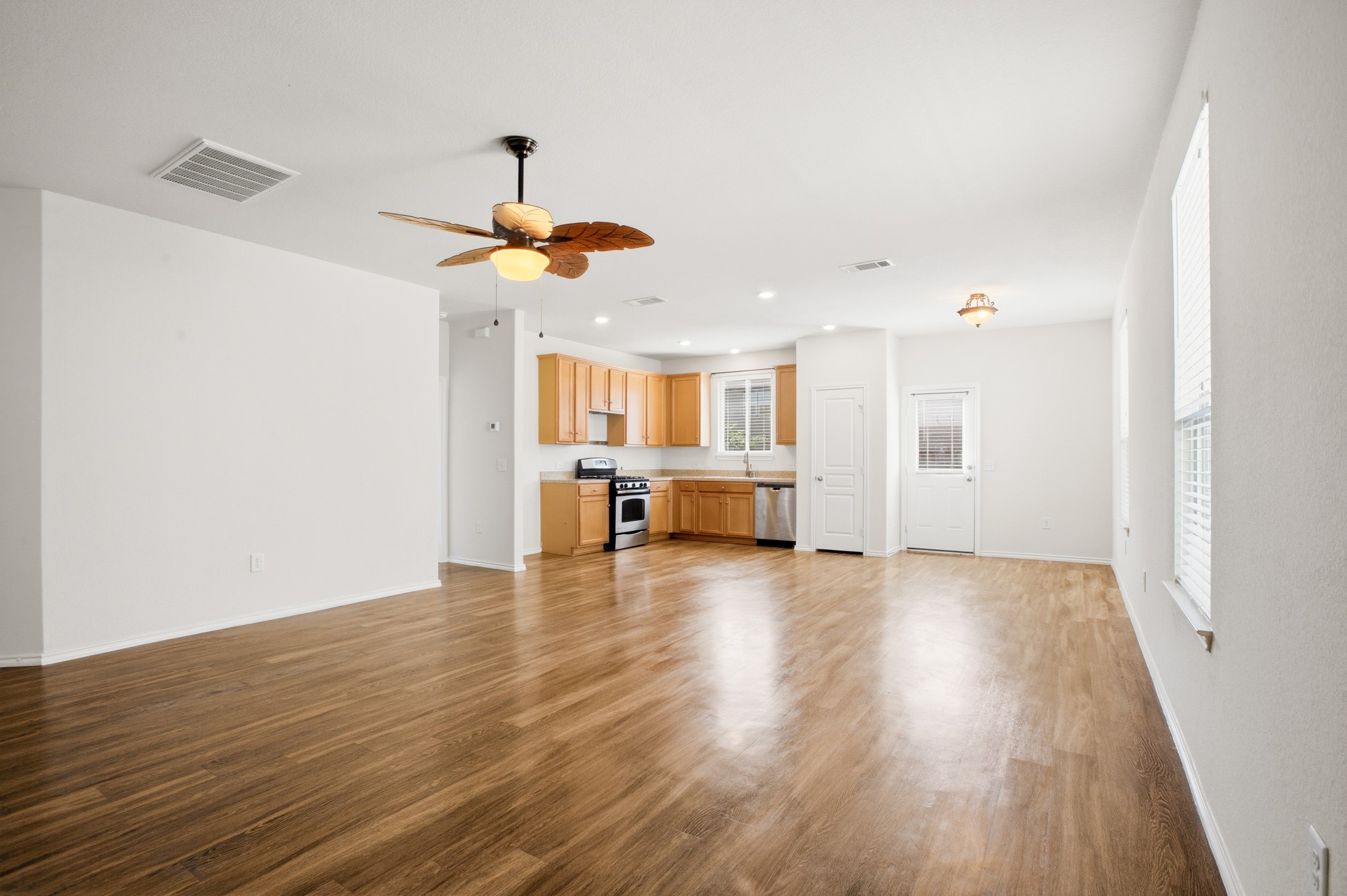 4611 Windmill Run Drive Houston, TX 77069 - Photo 10 of 35 a view of an empty room with wooden floor