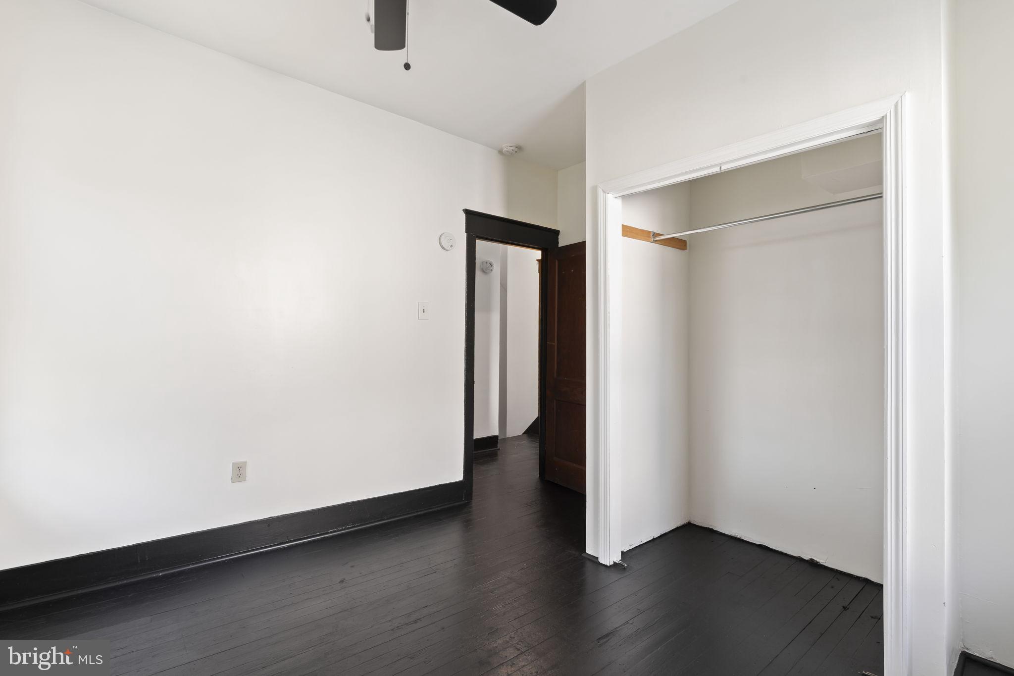 724 Ash Avenue, Unit 2 Collingdale, PA 19023 - Photo 3 of 17 a view of an empty room with wooden floor