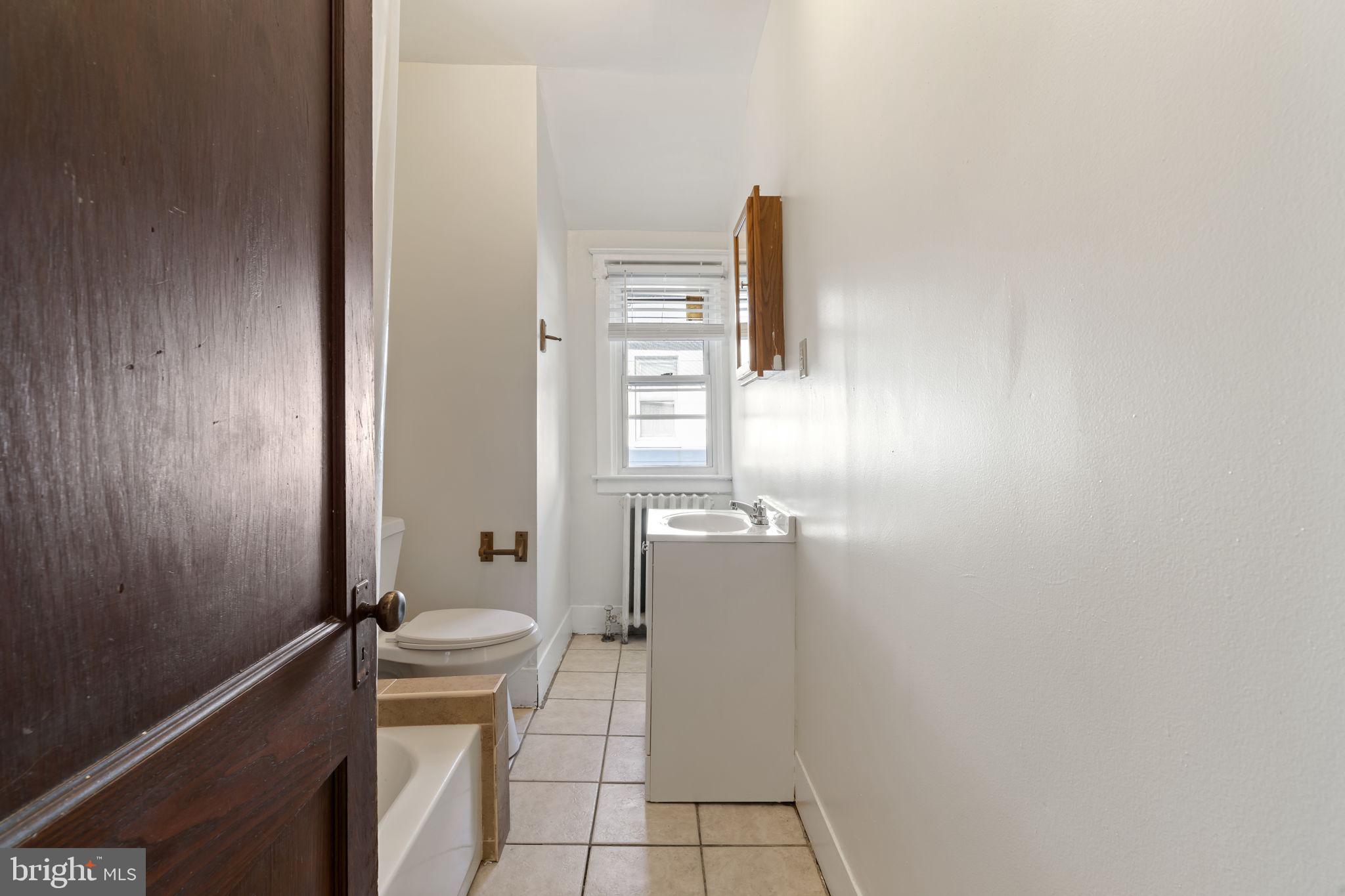 724 Ash Avenue, Unit 2 Collingdale, PA 19023 - Photo 8 of 17 a bathroom with a toilet