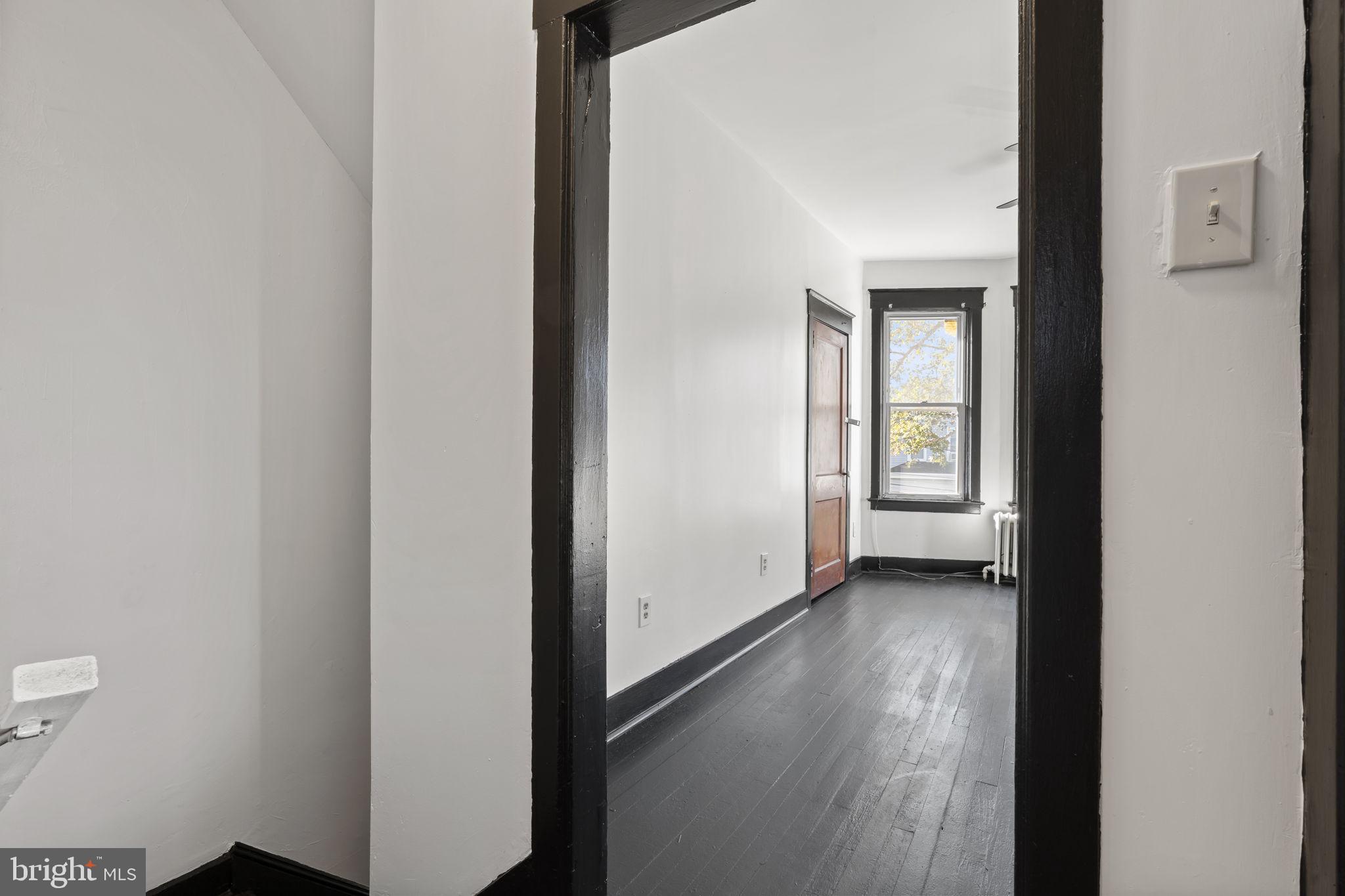 724 Ash Avenue, Unit 2 Collingdale, PA 19023 - Photo 10 of 17 a view of hallway with closet and a white door