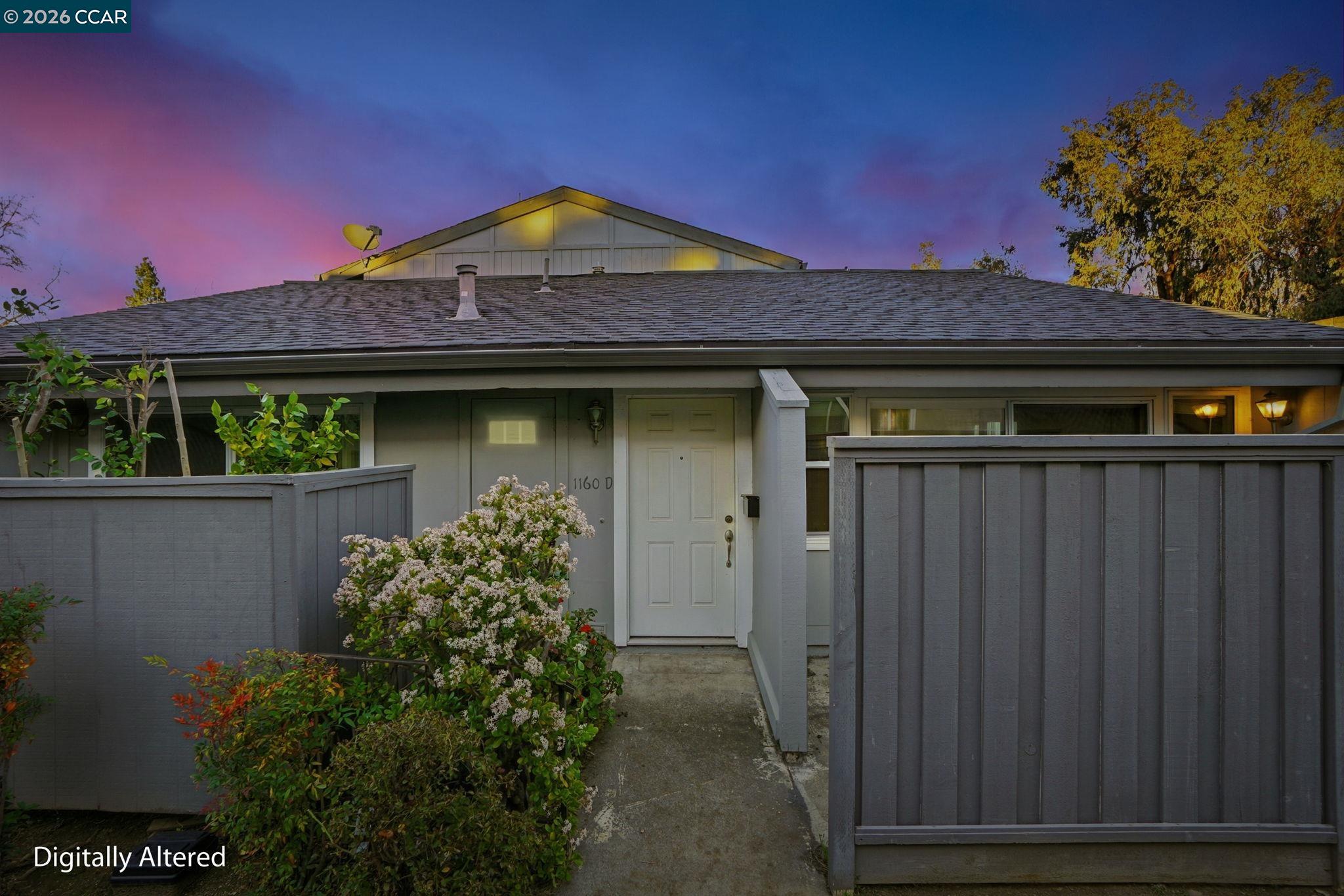 1160 Kenwal Road, Unit D Concord, CA 94521 - Photo 1 of 38 a front view of a house with garden