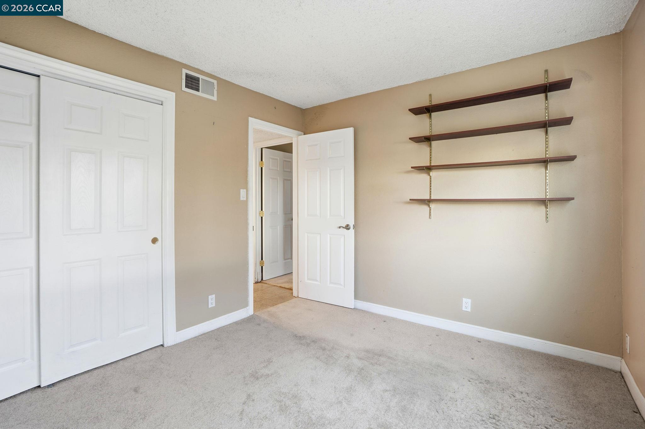 1160 Kenwal Road, Unit D Concord, CA 94521 - Photo 17 of 38 a view of an empty room
