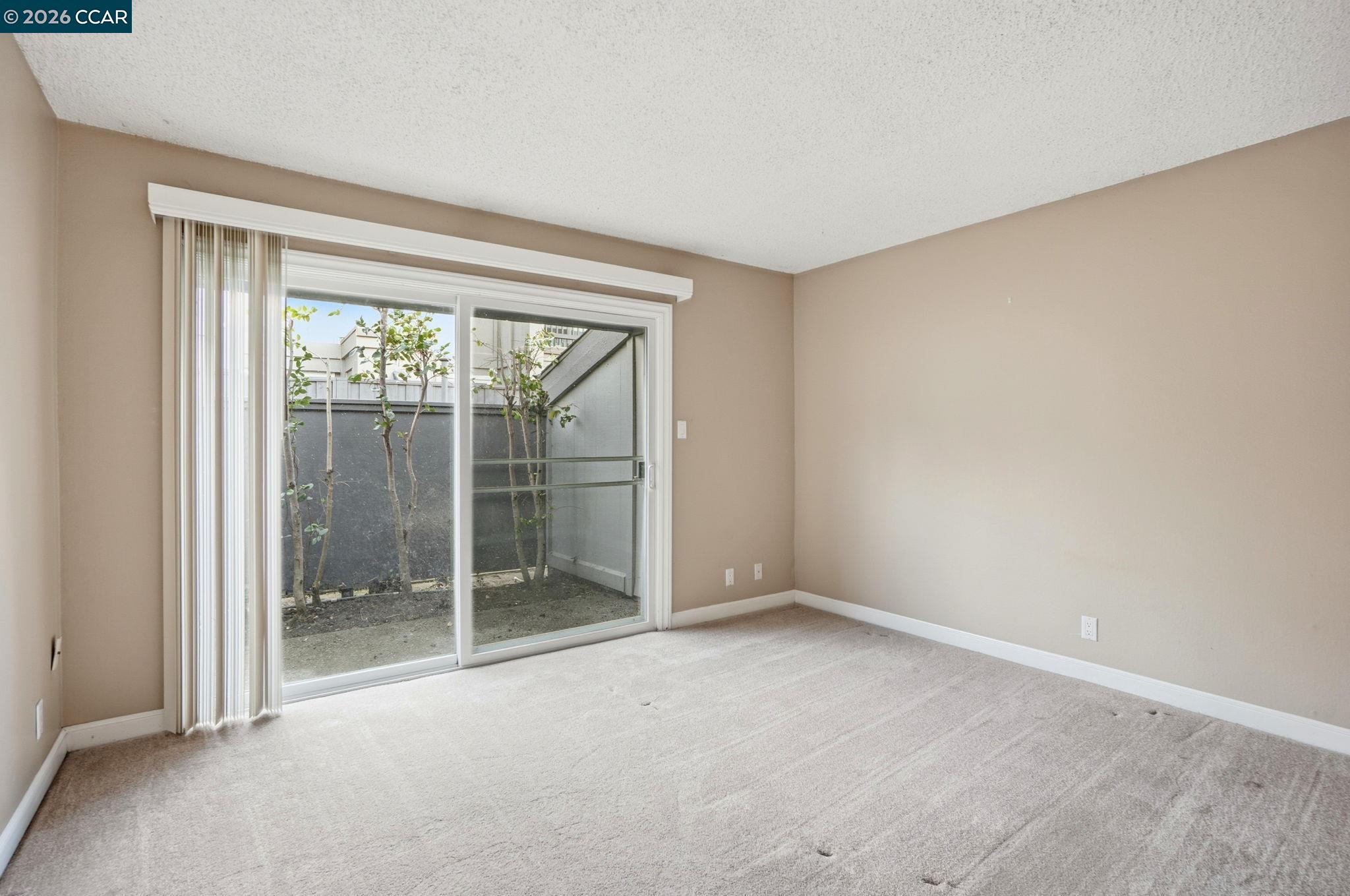 1160 Kenwal Road, Unit D Concord, CA 94521 - Photo 19 of 38 an empty room with window