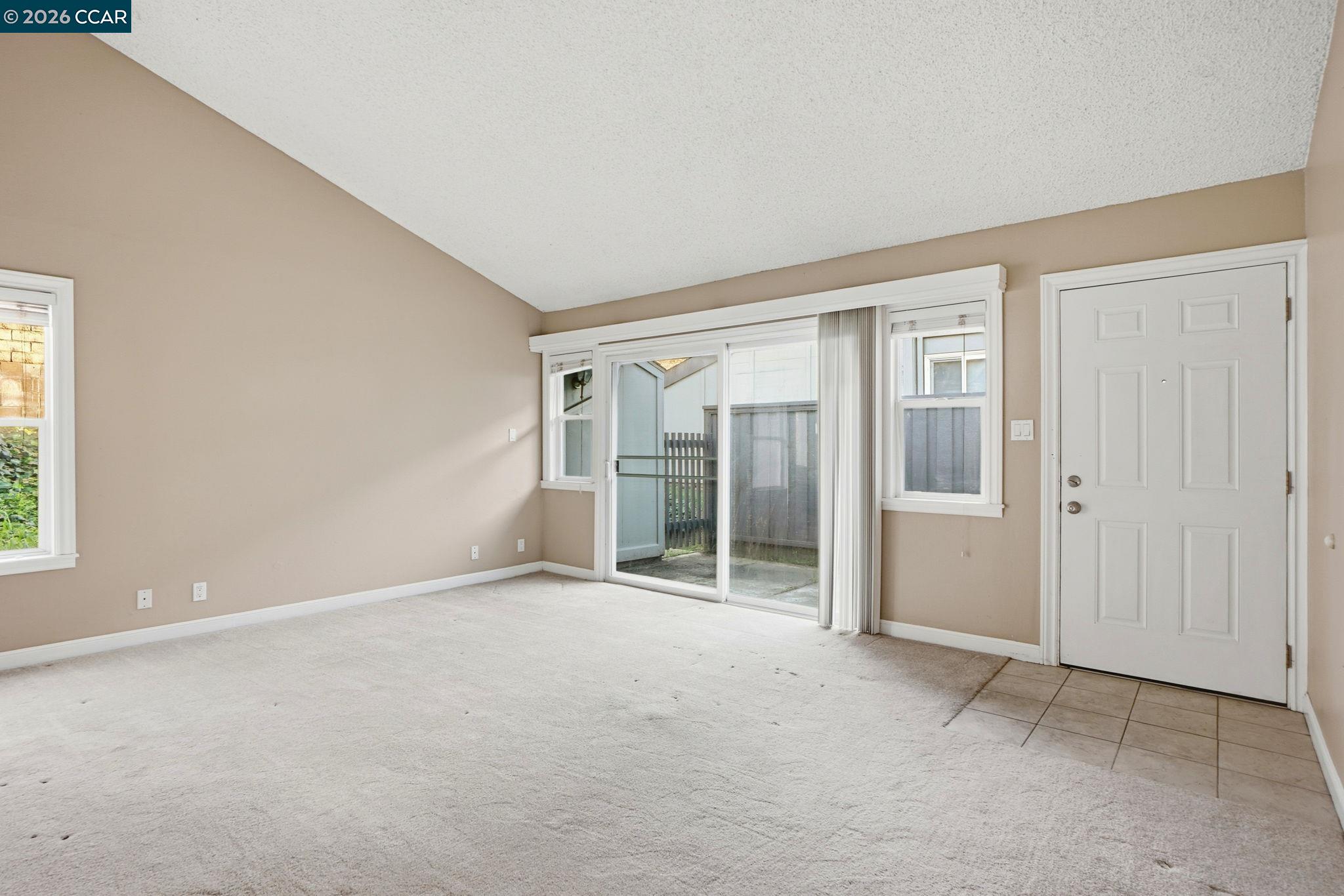 1160 Kenwal Road, Unit D Concord, CA 94521 - Photo 4 of 38 an empty room with windows