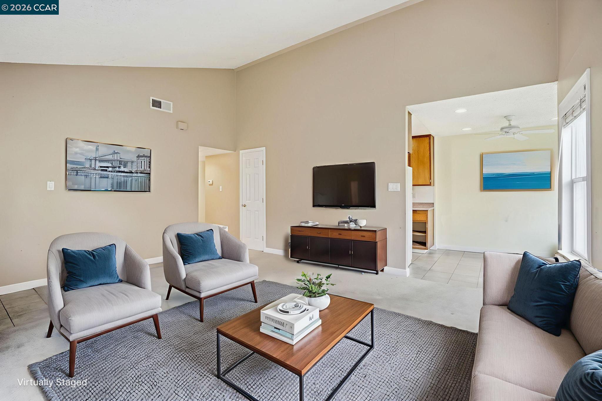 1160 Kenwal Road, Unit D Concord, CA 94521 - Photo 6 of 38 a living room with furniture and a flat screen tv