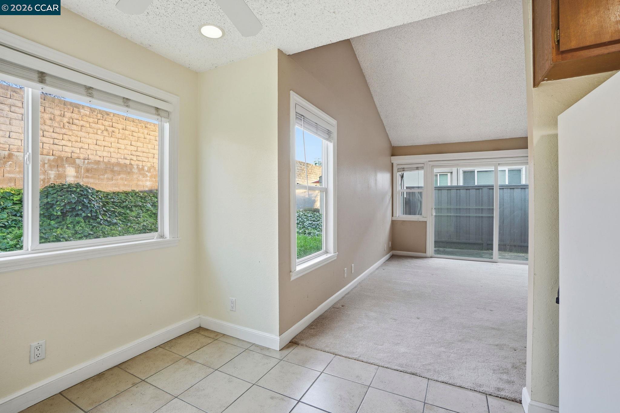 1160 Kenwal Road, Unit D Concord, CA 94521 - Photo 8 of 38 an empty room with windows