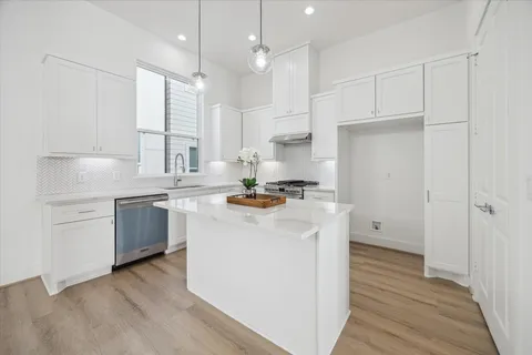 a view of a small space with wooden floor