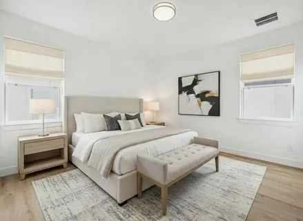 a kitchen with stainless steel appliances a sink stove and cabinets