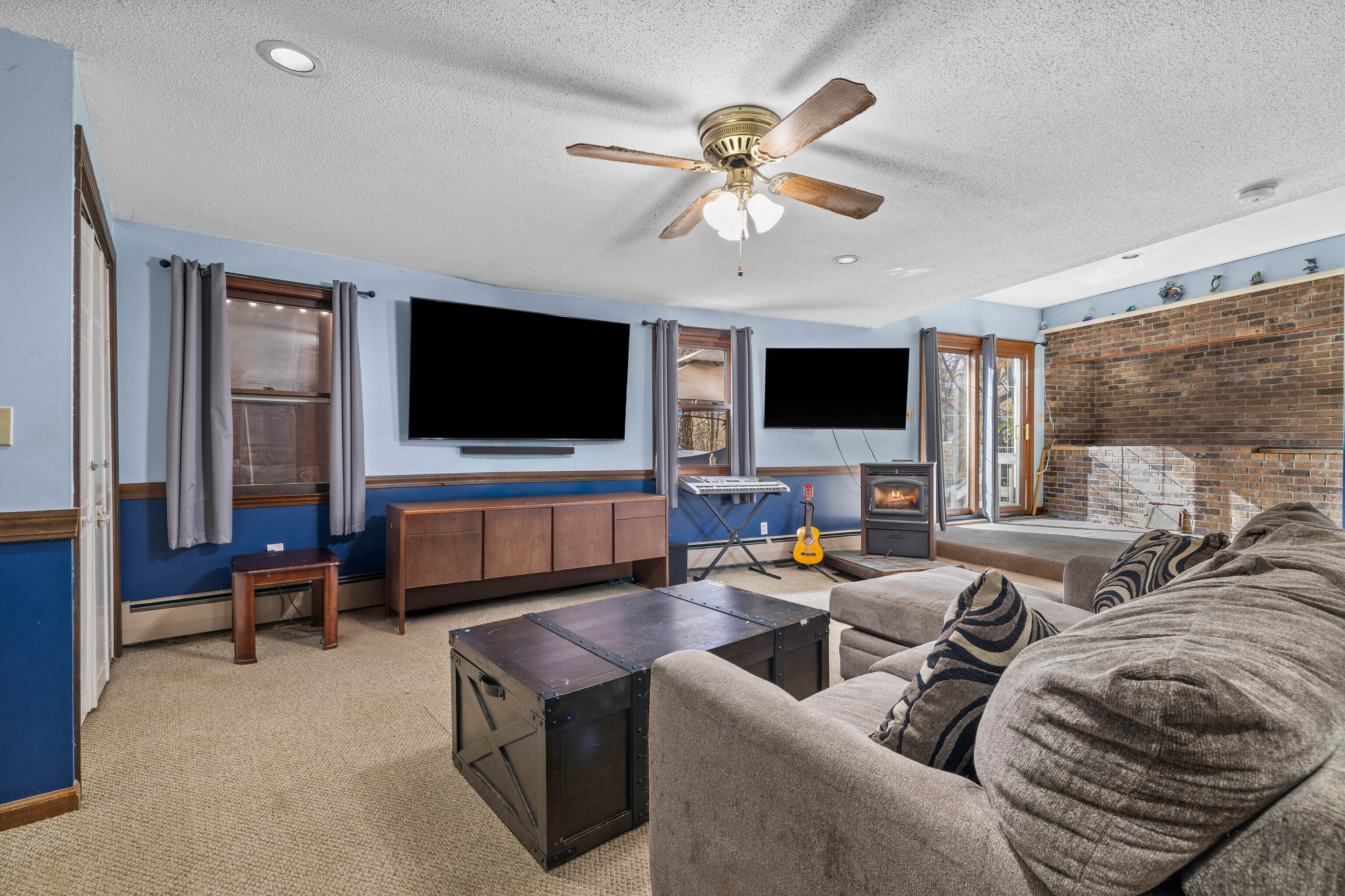 63 Burr Road Haddam, CT 06441 - Photo 11 of 38 a living room with furniture and a flat screen tv