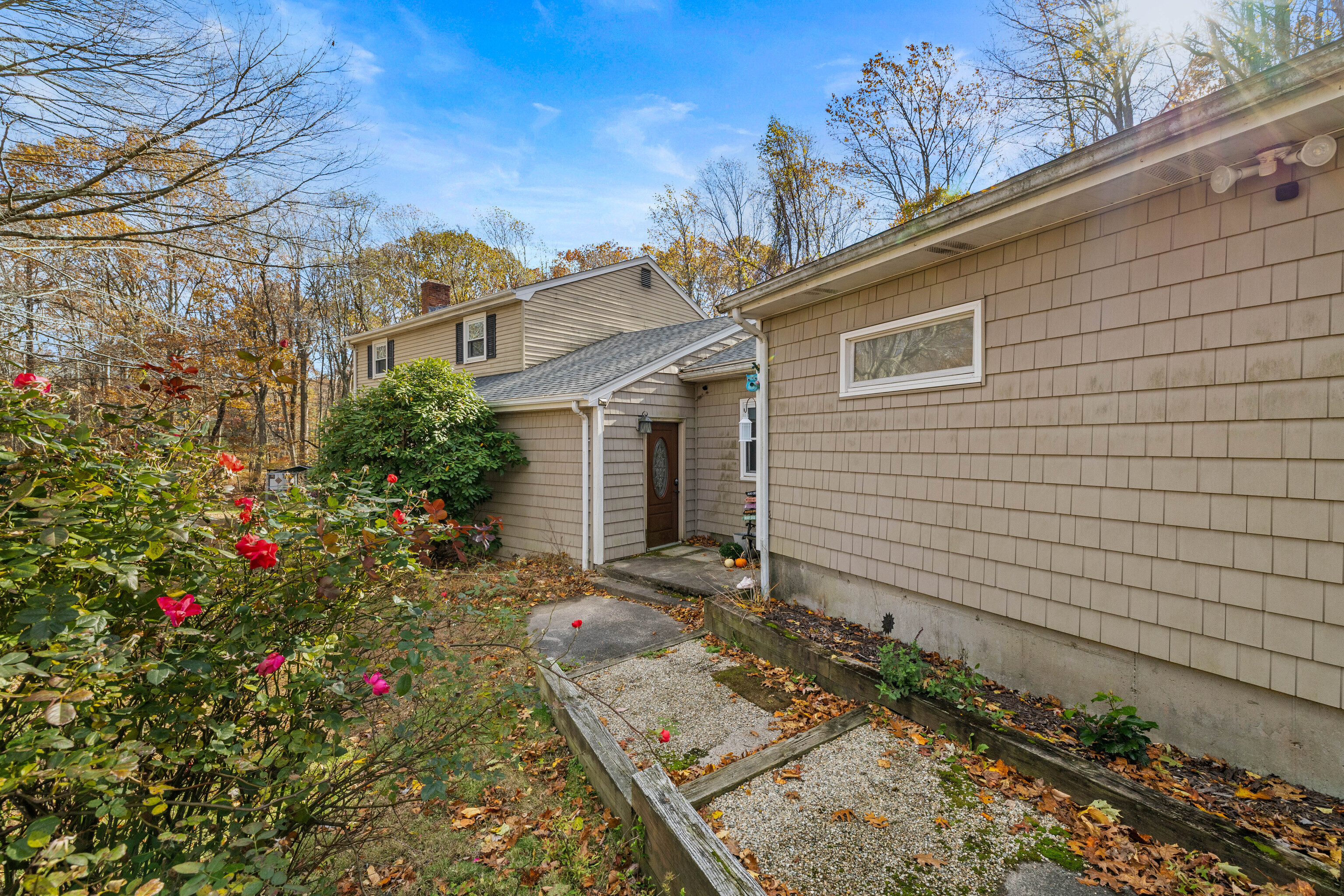 63 Burr Road Haddam, CT 06441 - Photo 2 of 38 a view of a house with a backyard