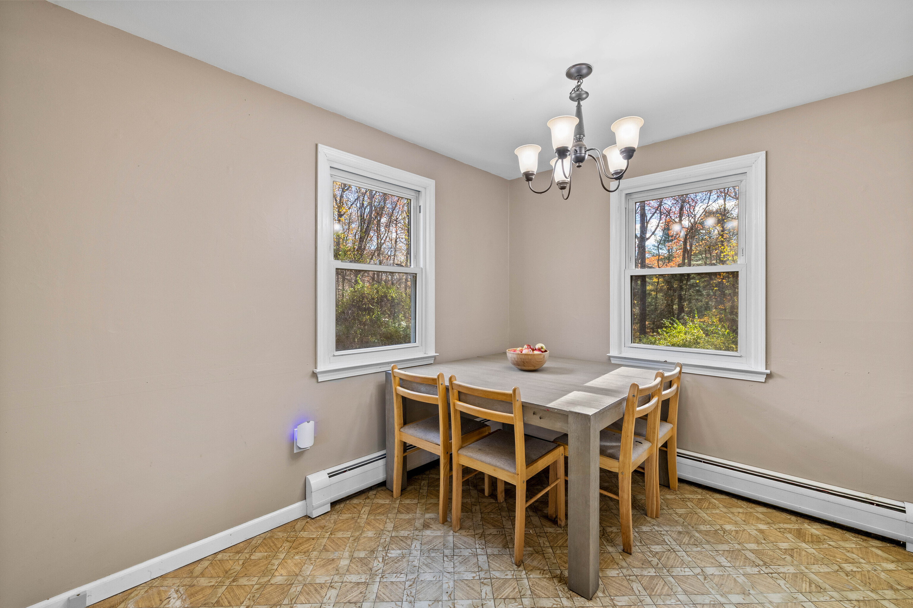 63 Burr Road Haddam, CT 06441 - Photo 23 of 38 a dining room with furniture a chandelier and window