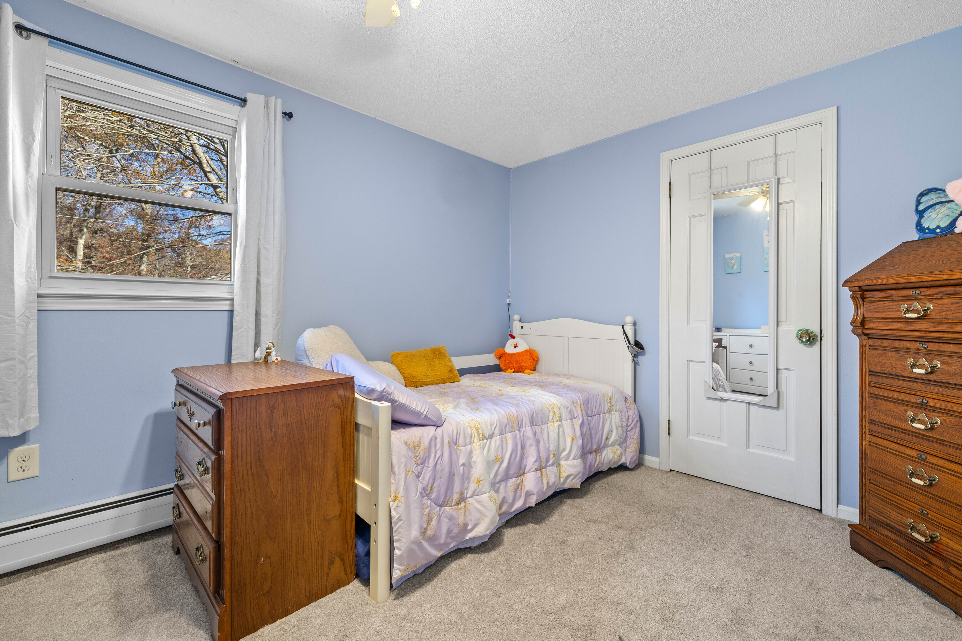 63 Burr Road Haddam, CT 06441 - Photo 30 of 38 a bedroom with bed and window