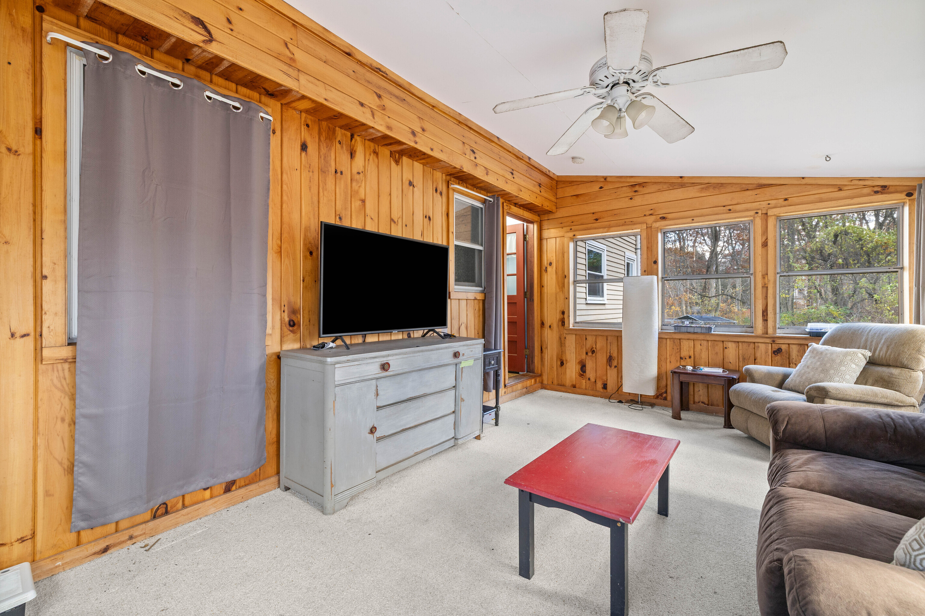 63 Burr Road Haddam, CT 06441 - Photo 34 of 38 a living room with furniture and a flat screen tv