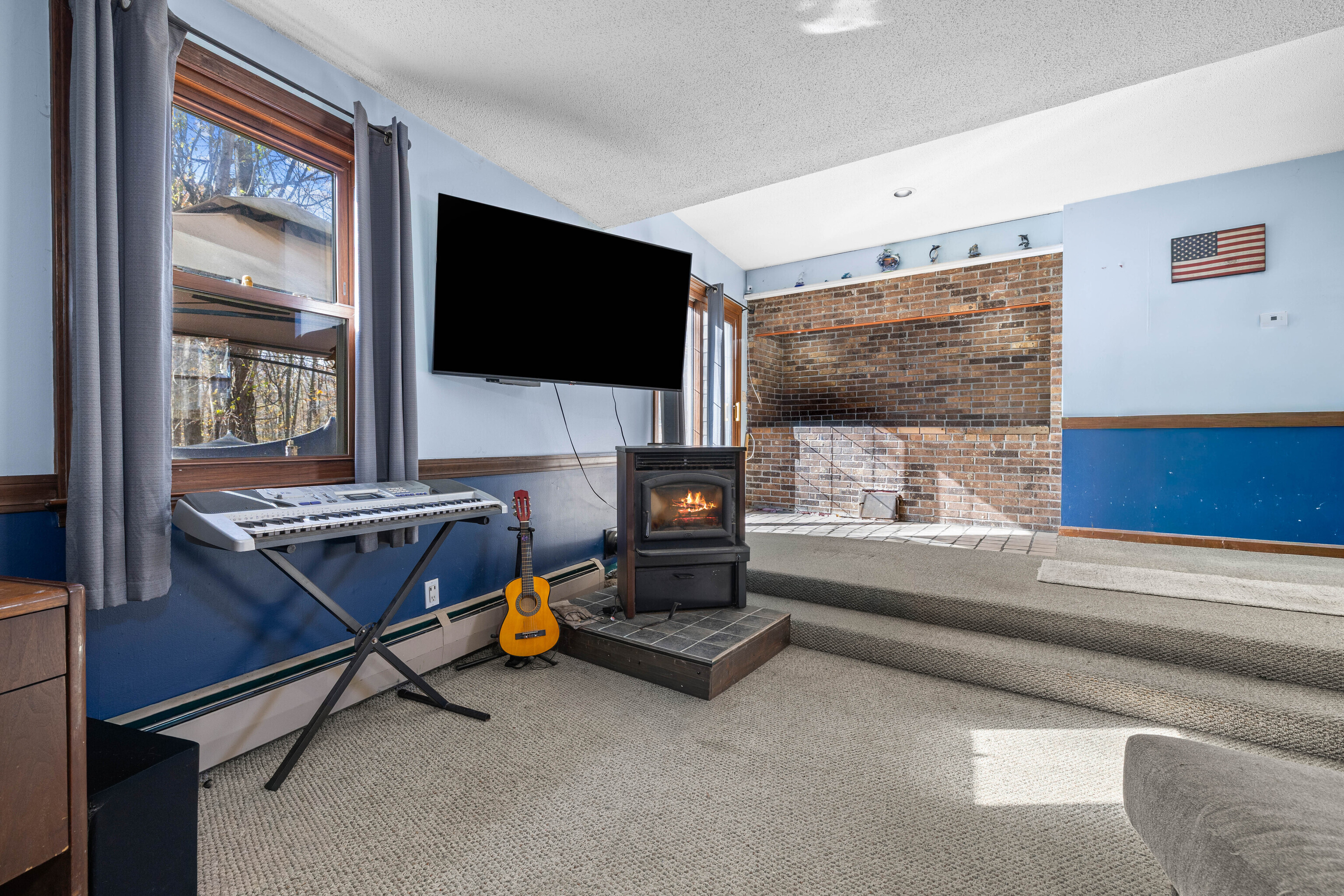 63 Burr Road Haddam, CT 06441 - Photo 8 of 38 a living room with furniture and a flat screen tv