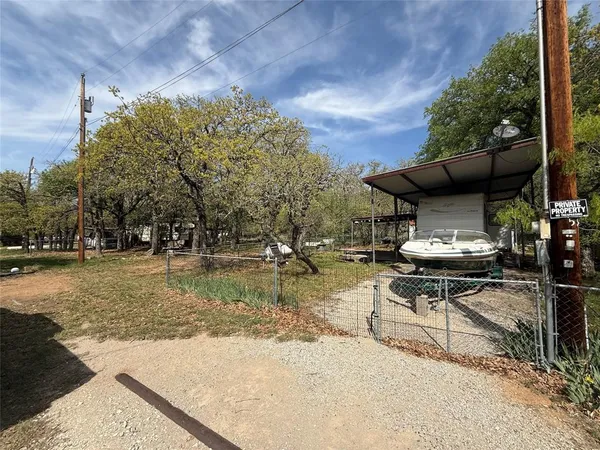 a view of a lake with sitting area